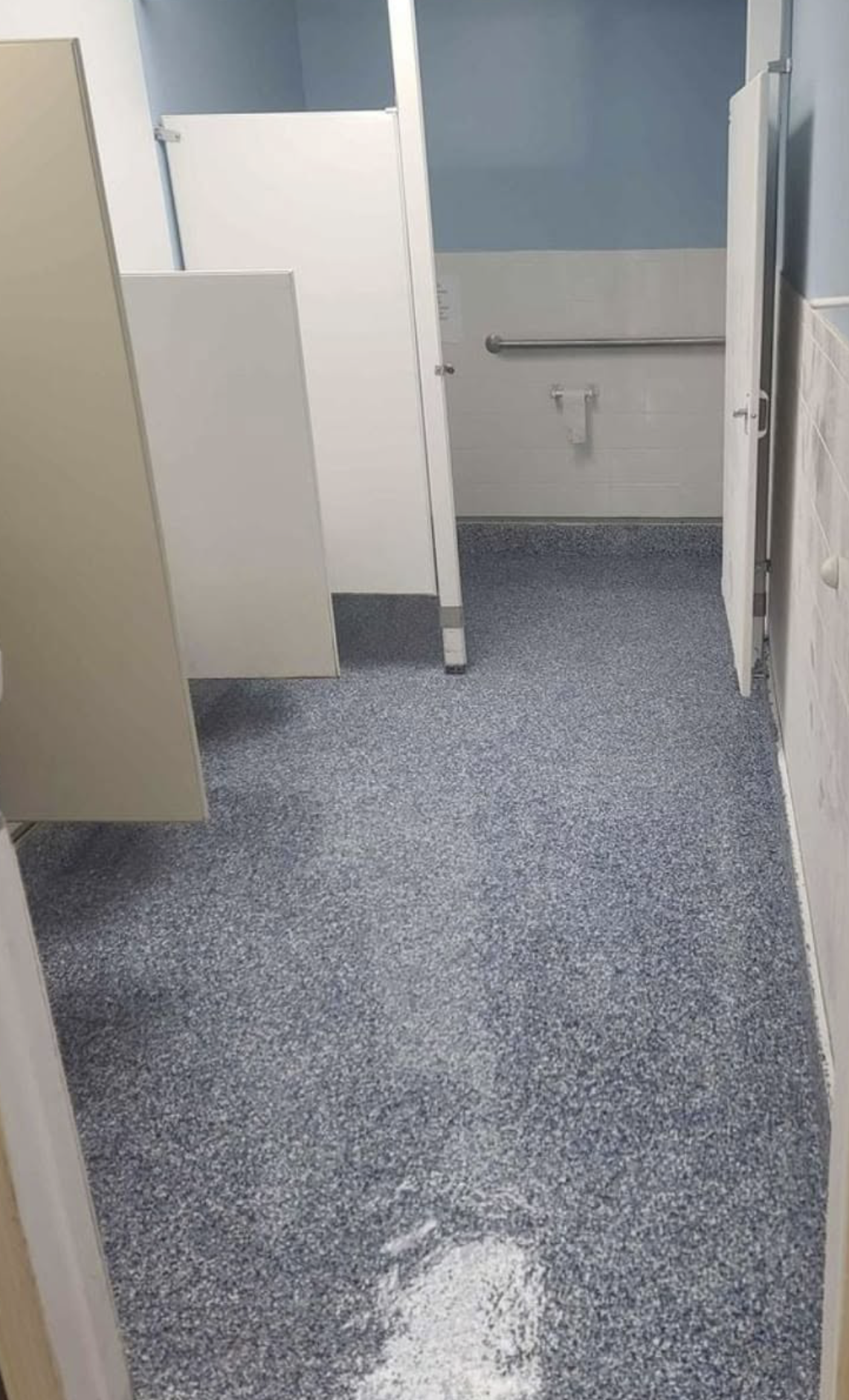 Speckled epoxy flooring.