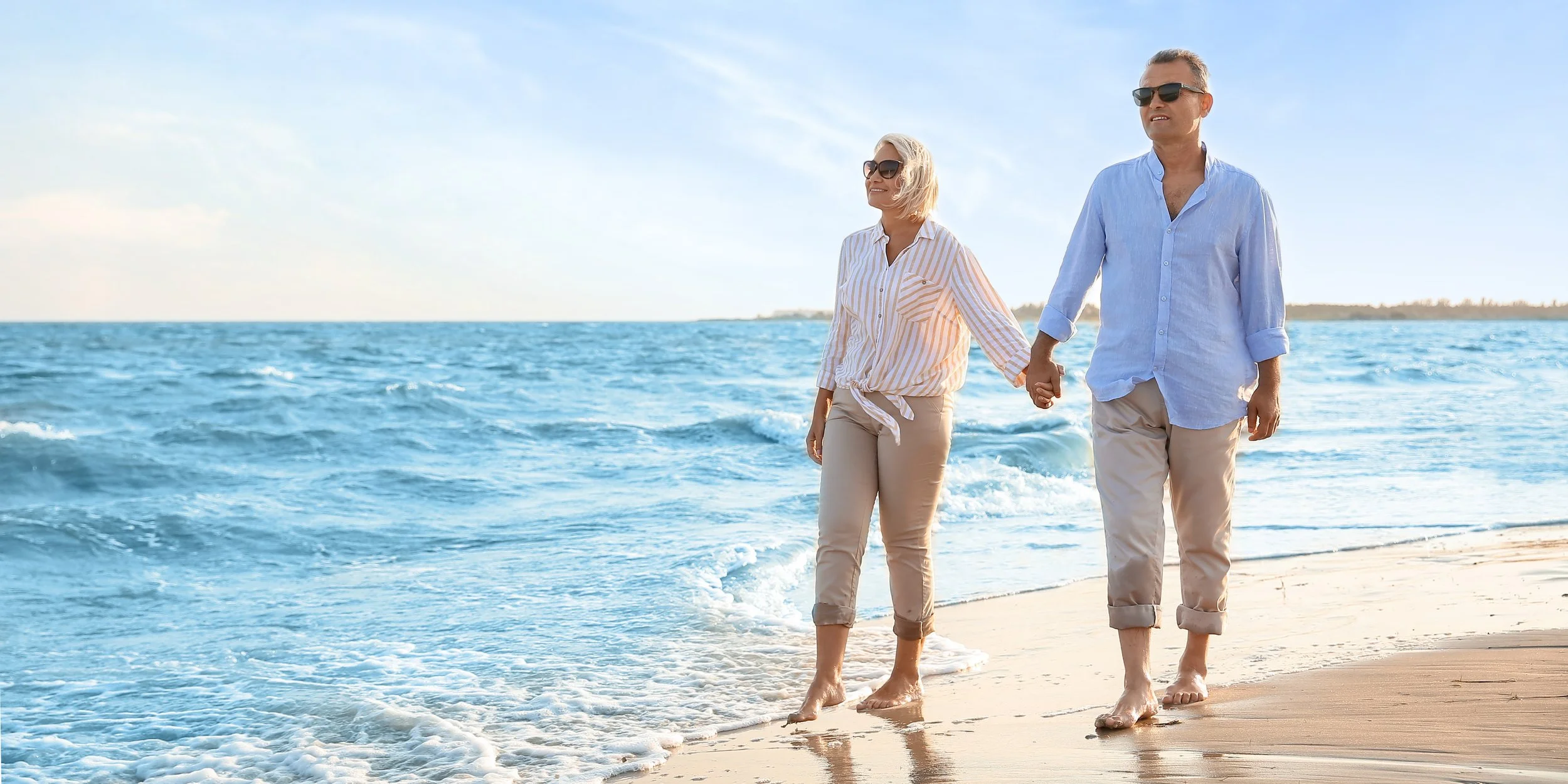 Couple walking on beach