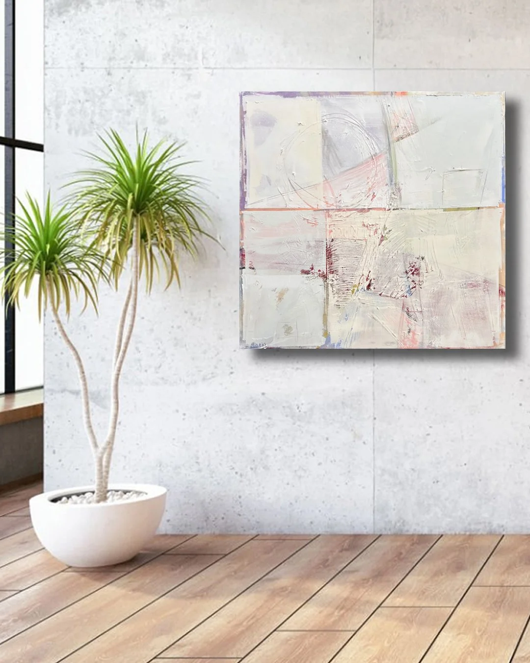 Modern interior with distressed white concrete wall, abstract white and beige painting, potted green plant, and wood floor.