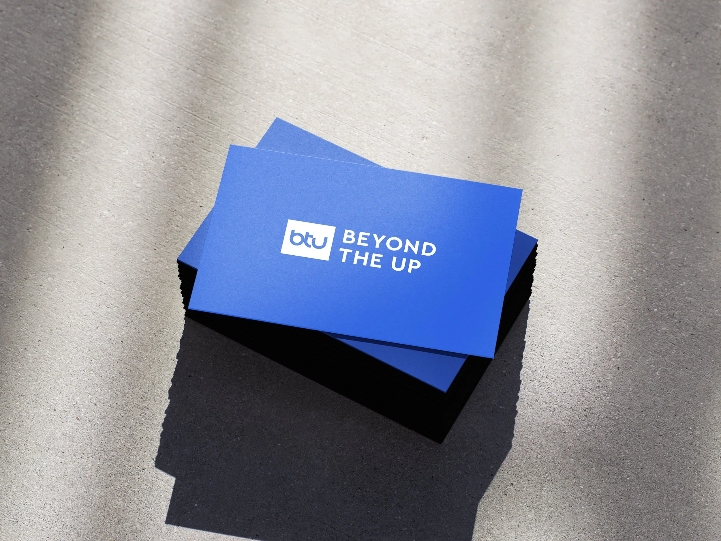 Blue Beyond The Up business cards featuring the official Softriver logo.
