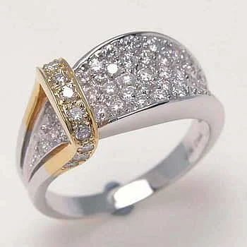 Wide silver-tone pavé ring crossed by a narrow gold-tone band set with clear stones.