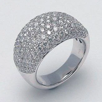 Wide silver-tone dome ring with closely set clear stones across the top.