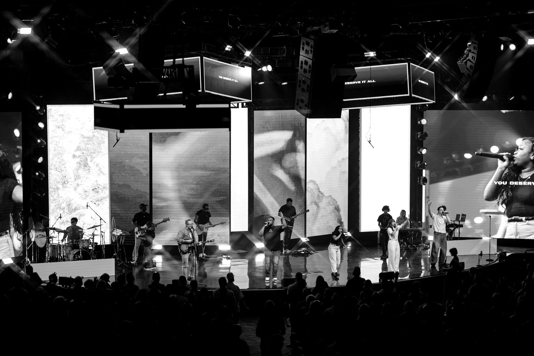 Worship band leading a service on stage