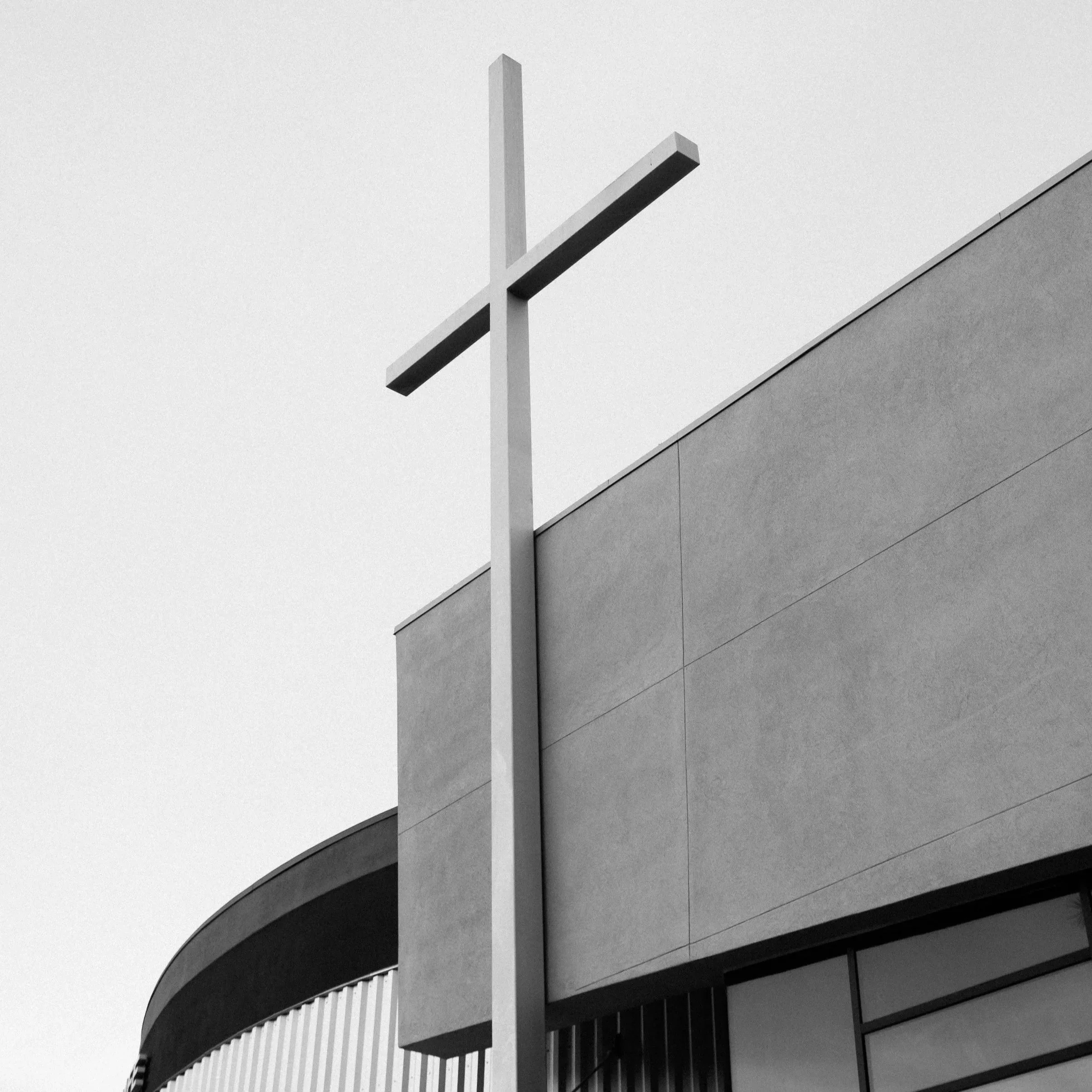 Cross on the side of a modern church building