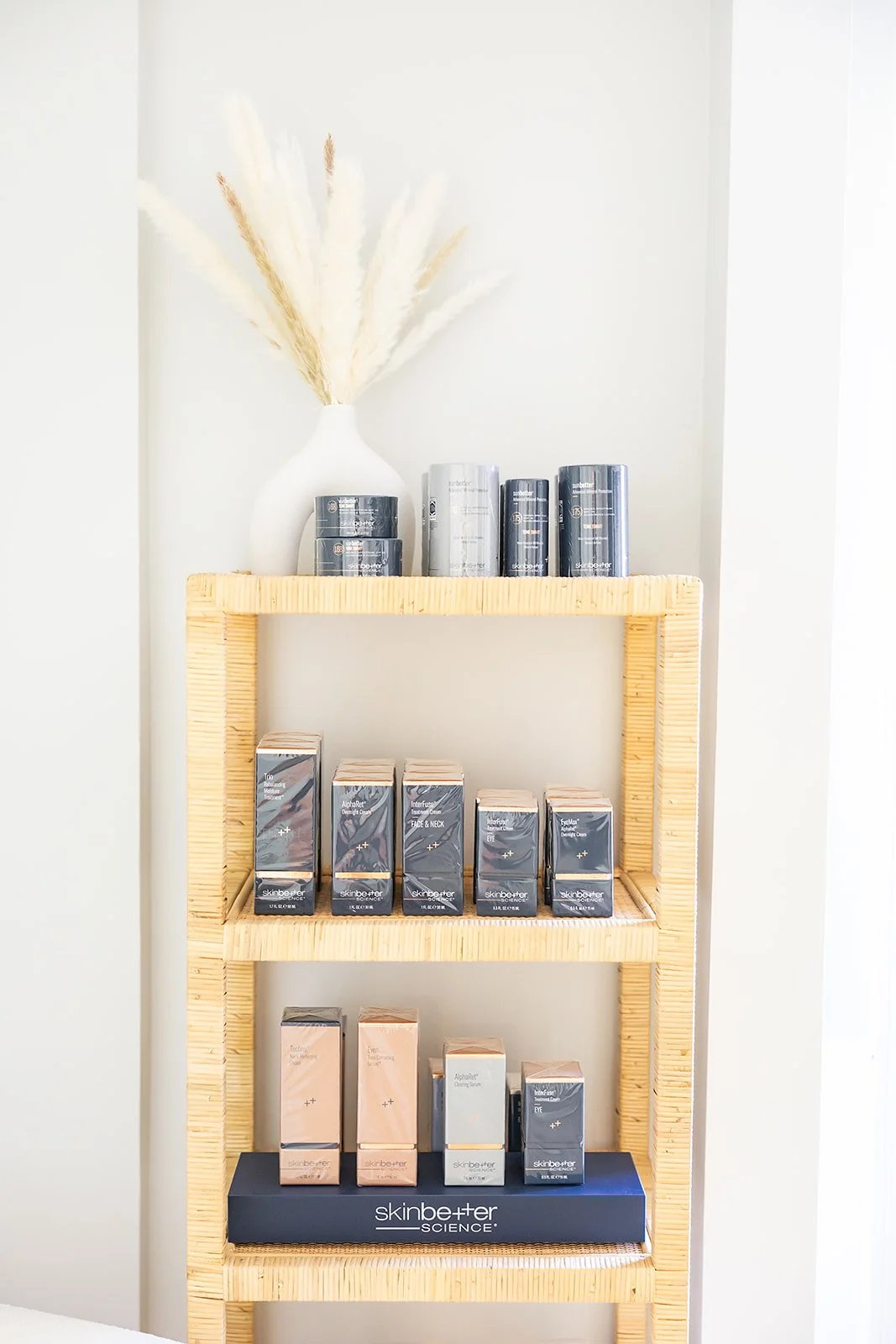 A shelf stocked with medical grade skincare at a med spa.