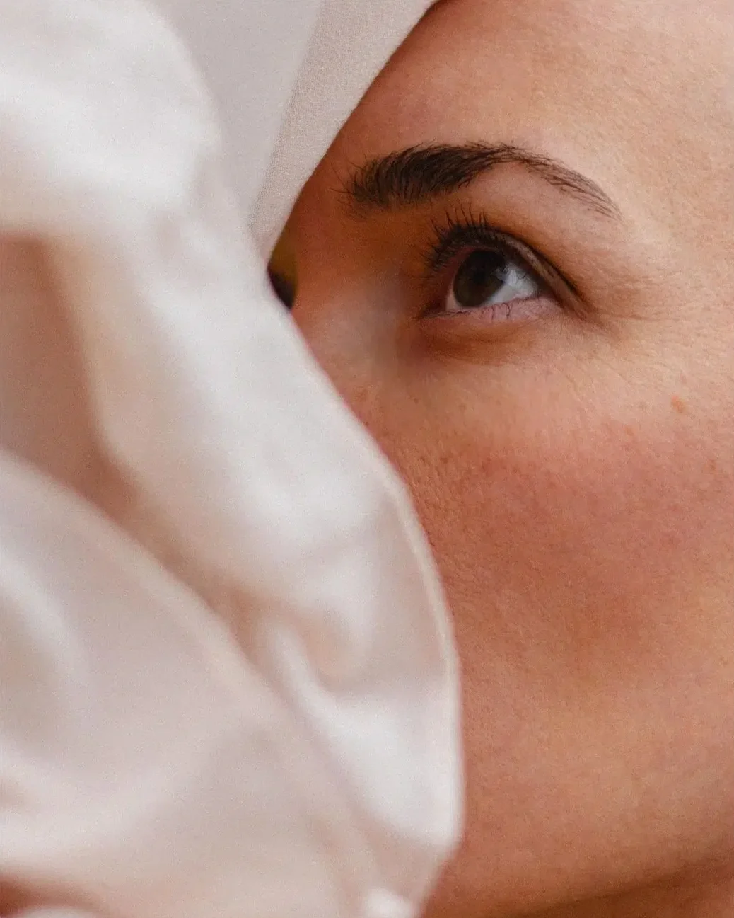 Close-up of a person's clear skin after a med spa treatment.