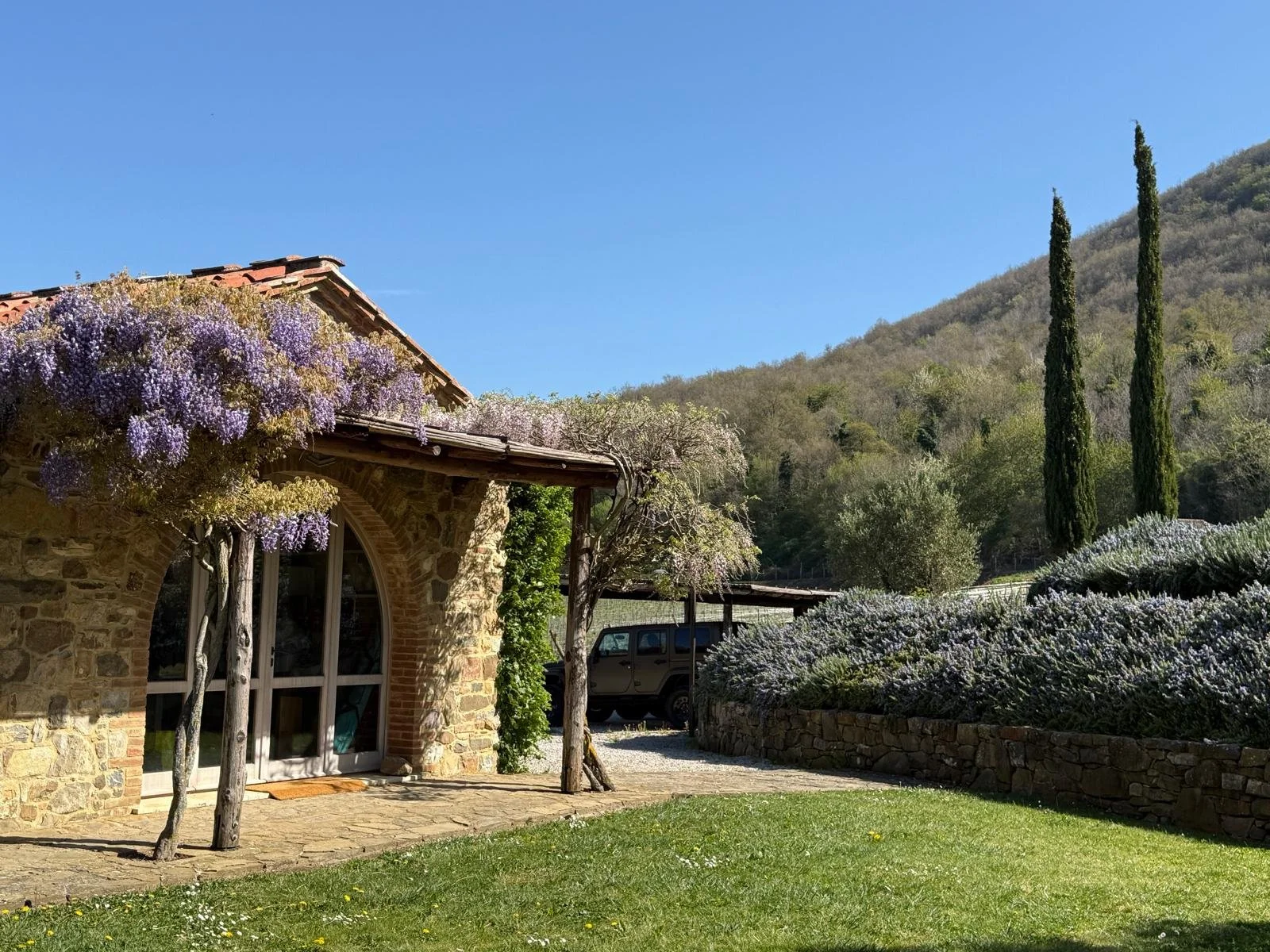 Luxury stone cottage accommodations at Castello di Fosini Tuscan Pilates retreat