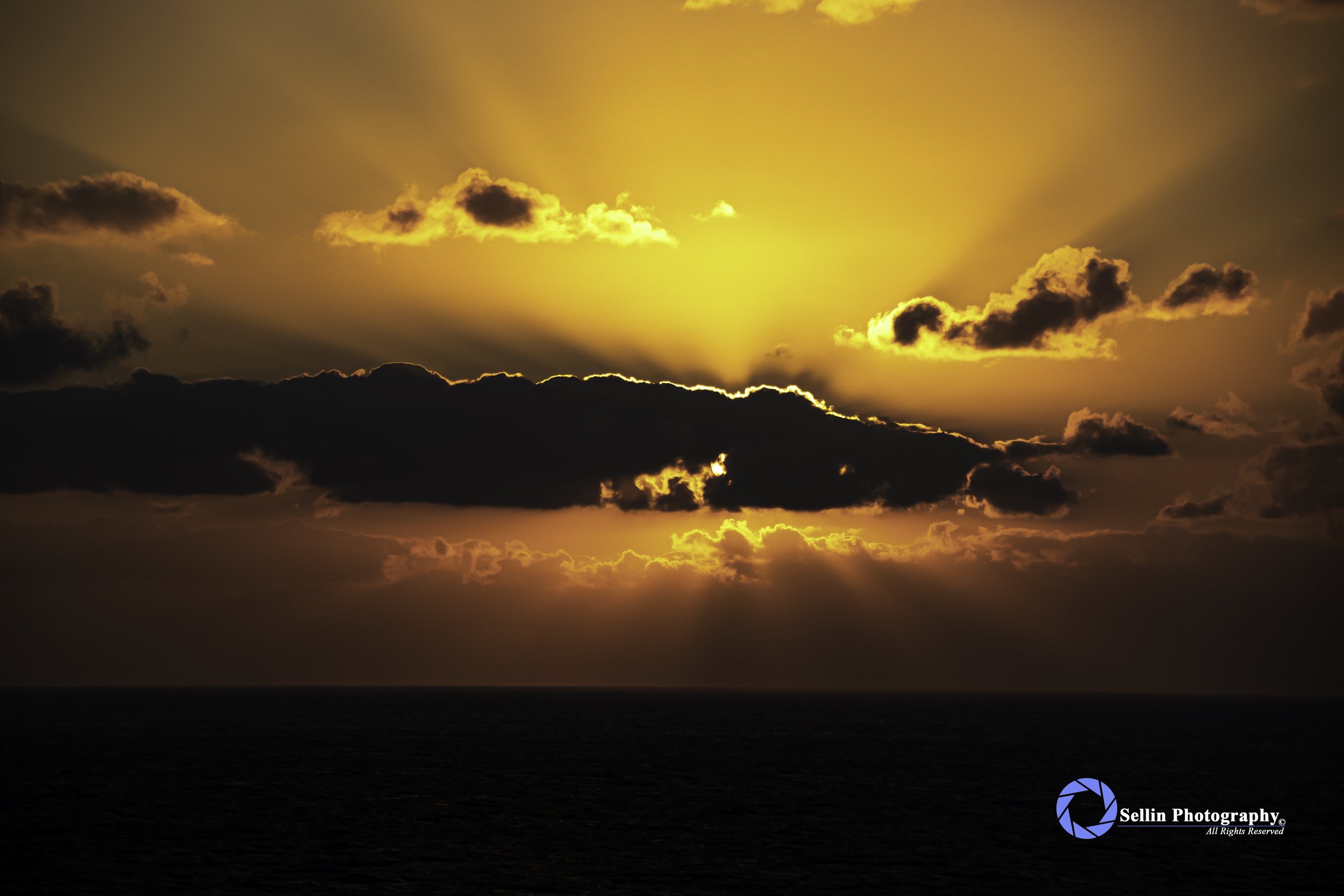 "Sun and Cloud Sunset"