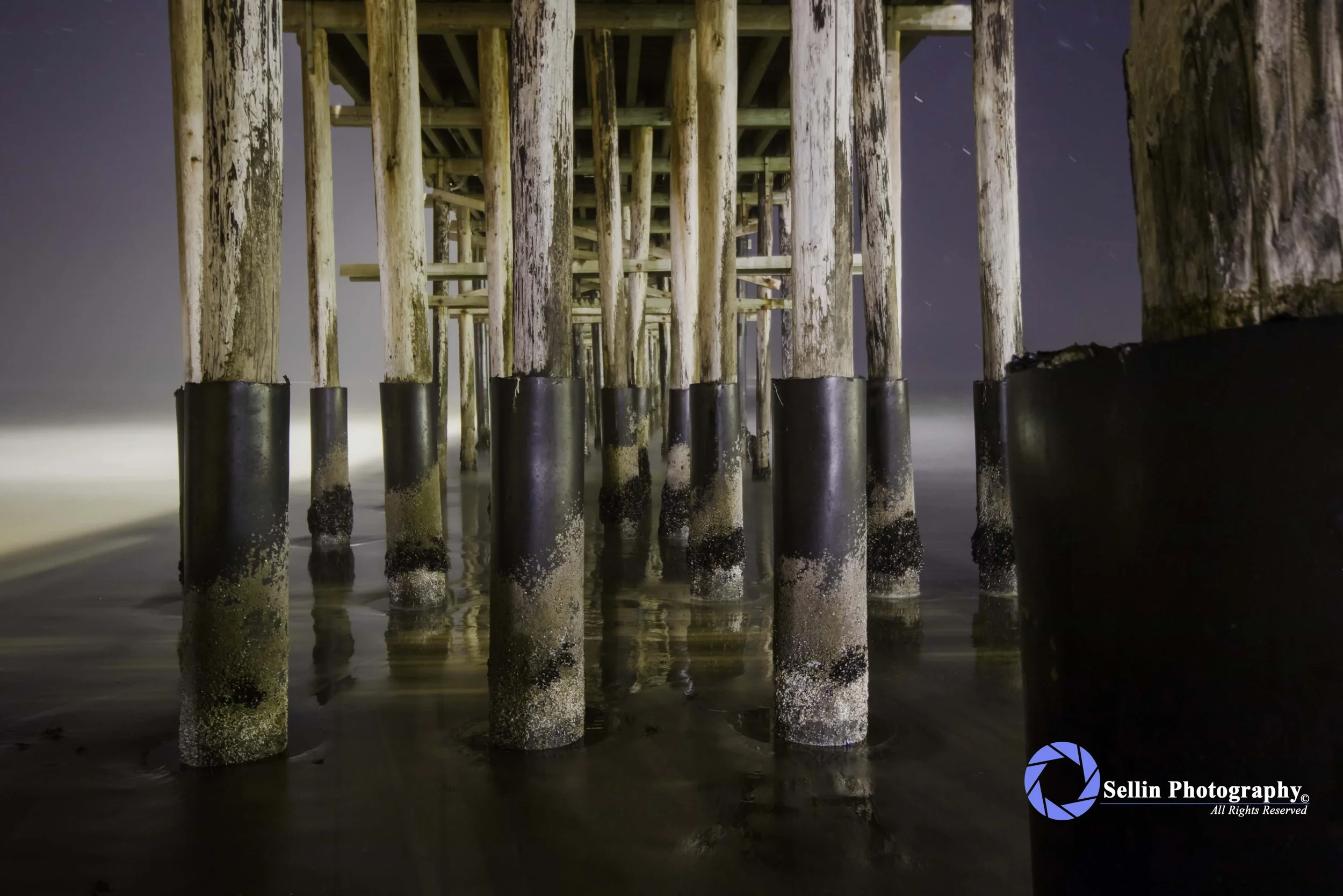"Underneath Ventura Pier at Night"