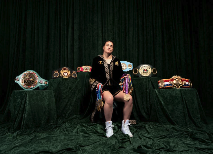 Katie Taylor with her championship belts
