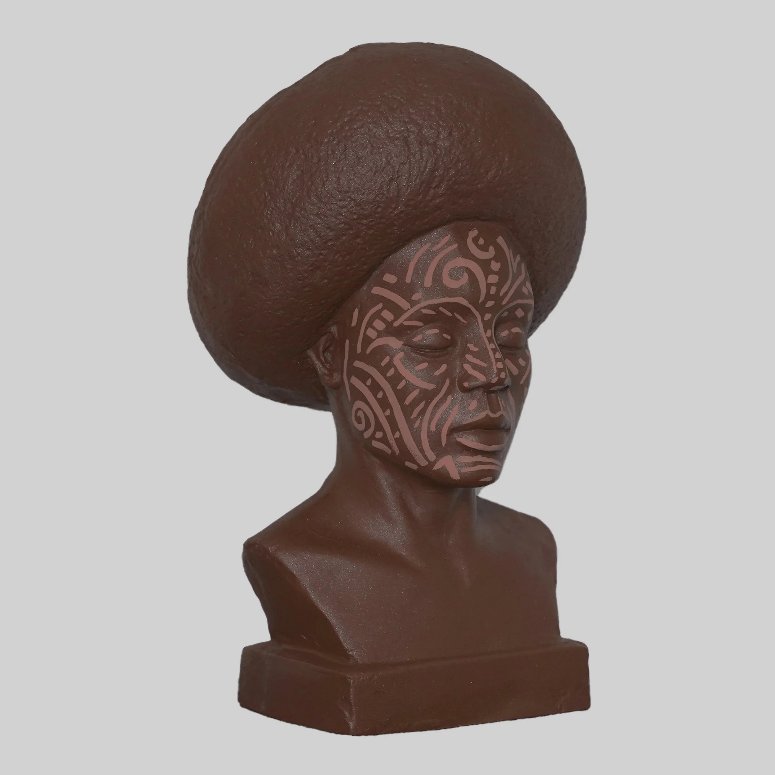 Resin sculpture finished with acrylic paint by Stanley Onah titled Sculpture V (2025) of a woman with afro hairstyling and ornate face markings.