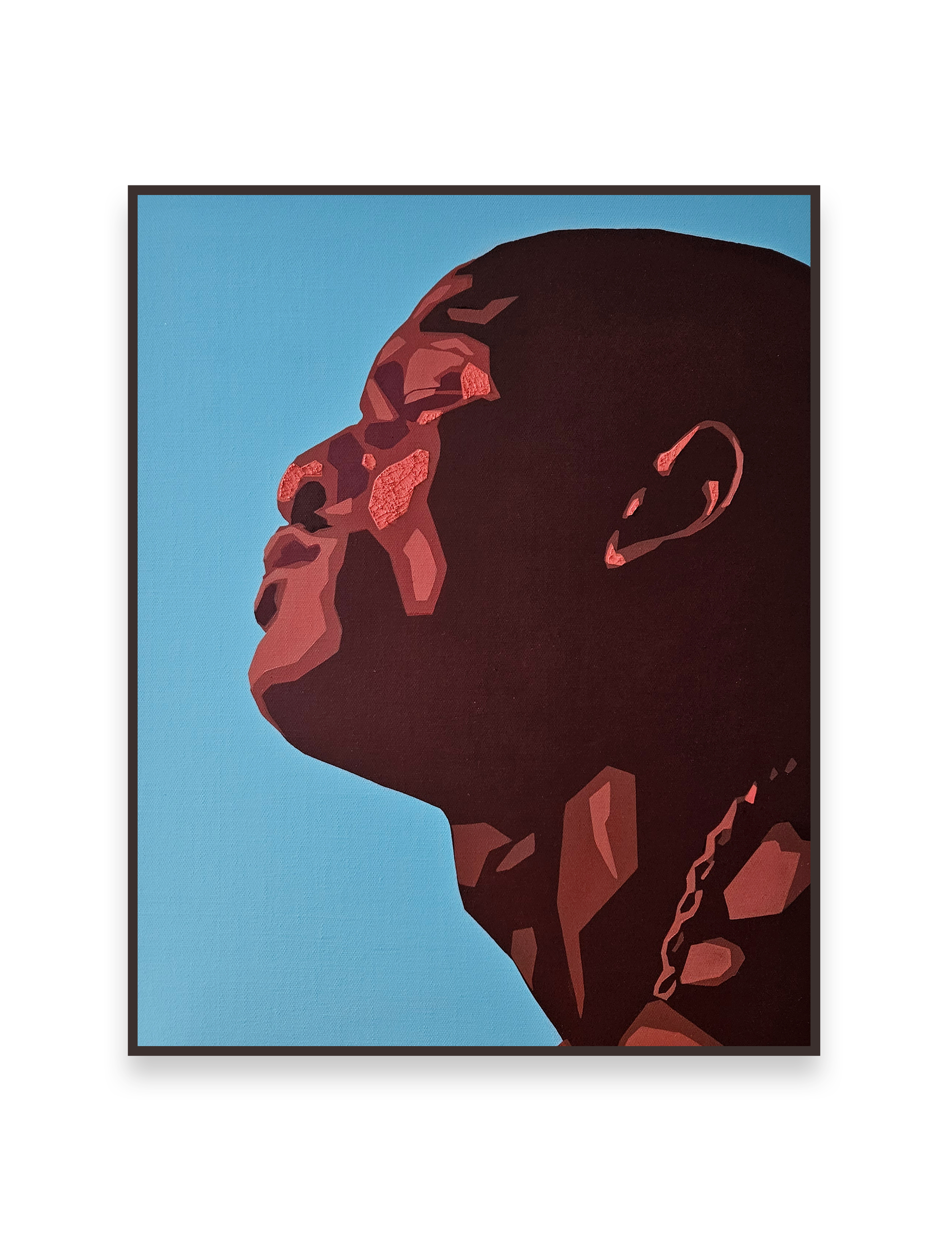 Painting titled "Red Shades of Heartache" (2024) from Stanley Onah's second solo exhibition titled "Mourning of Kin". Features a profile of man with simplified angular features and set against a blue background.
