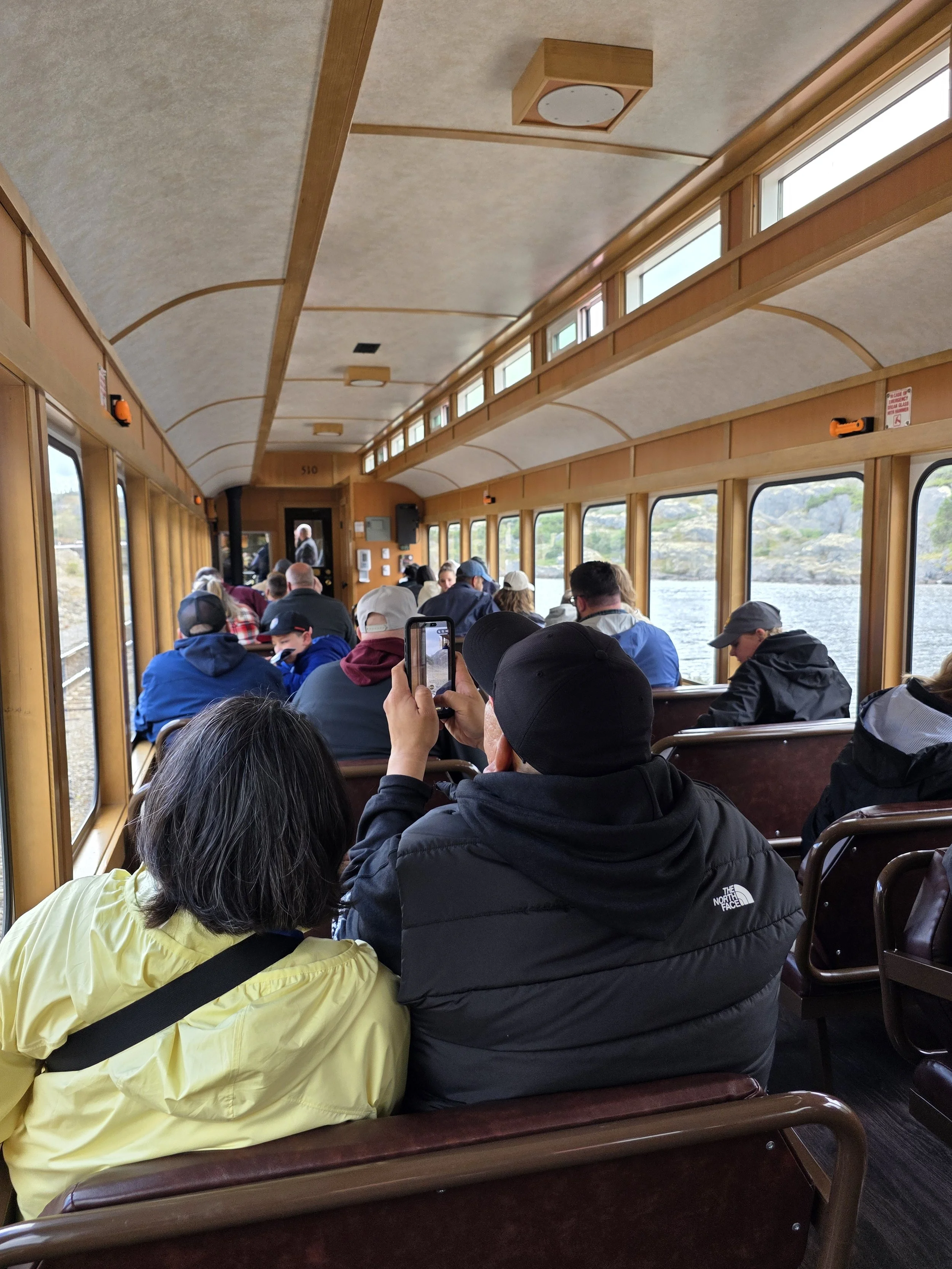 Passengers inside one of the cars on the White Pass Railway.