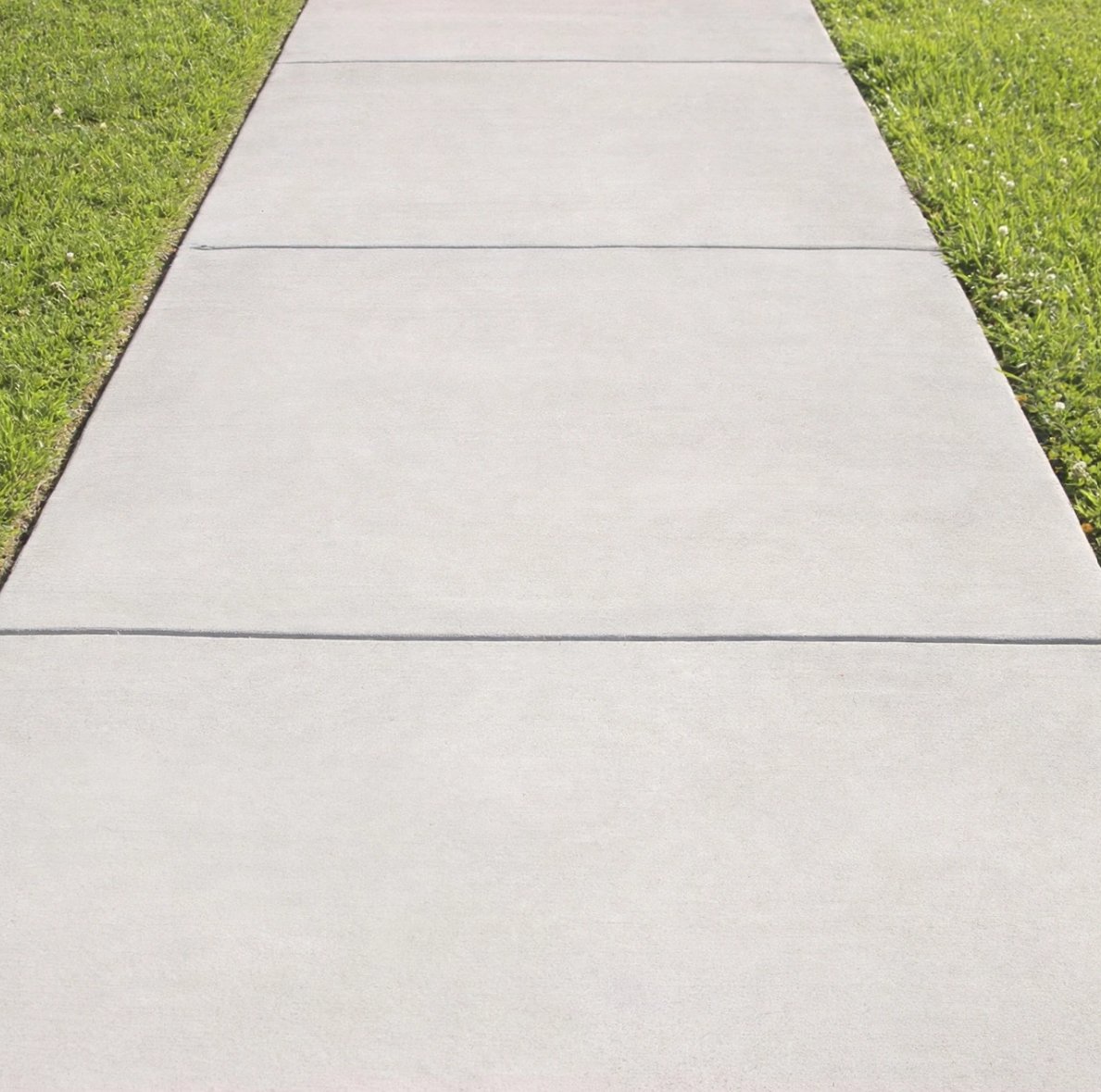 pressure washed concrete sidewalk which helps with curb appeal and helps to stay within HOA compliance