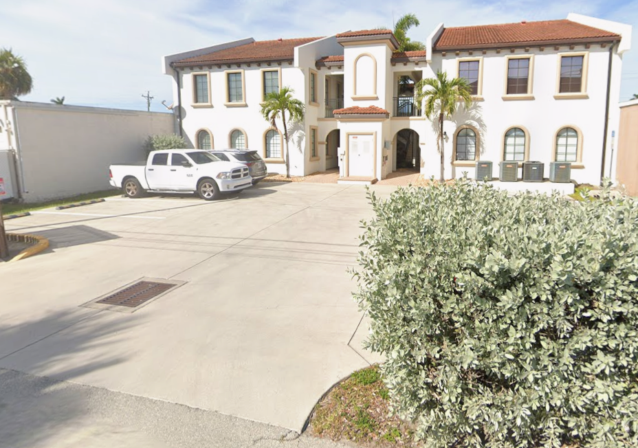 Back of office building. Handicap parking and accessible entry from here.