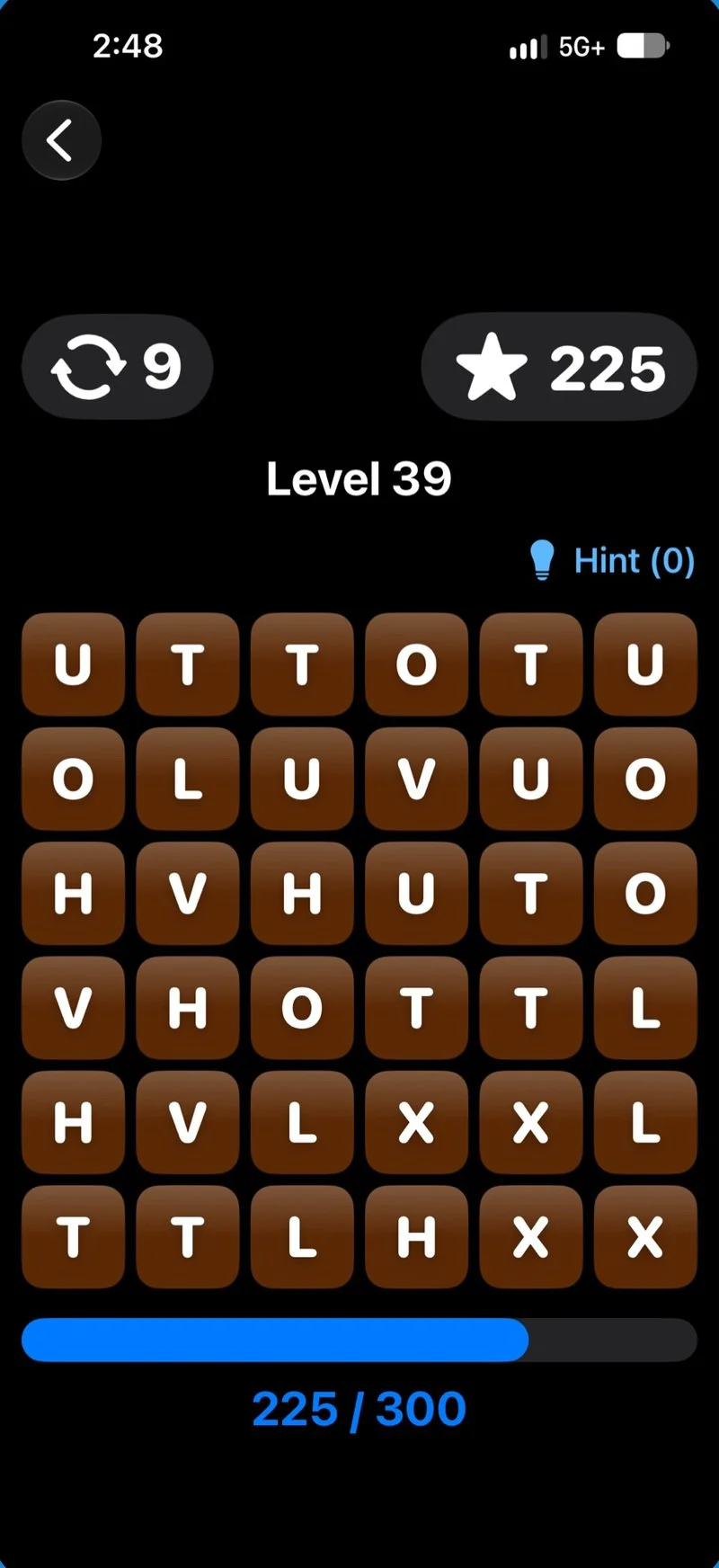 GlyphMatch in dark mode, showing a grid of brown letter tiles, Level 39, nine moves remaining, and a score of 225 toward 300.