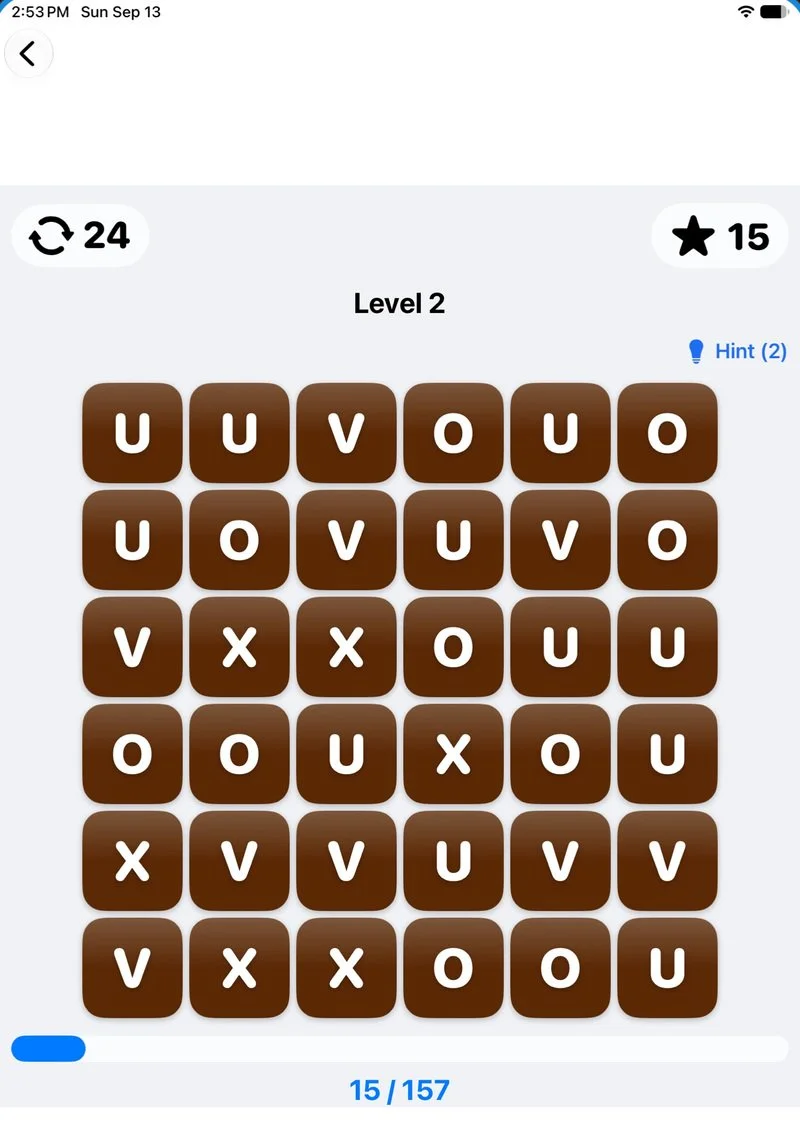 GlyphMatch in light mode on iPad, showing a grid of letter tiles, Level 2, moves, score, and a Hint control.