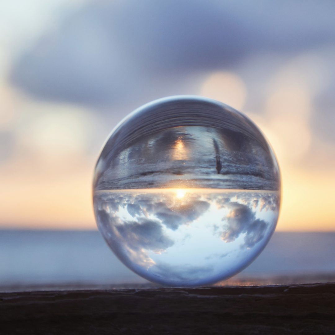 Glass sphere reflecting the surrounding landscape