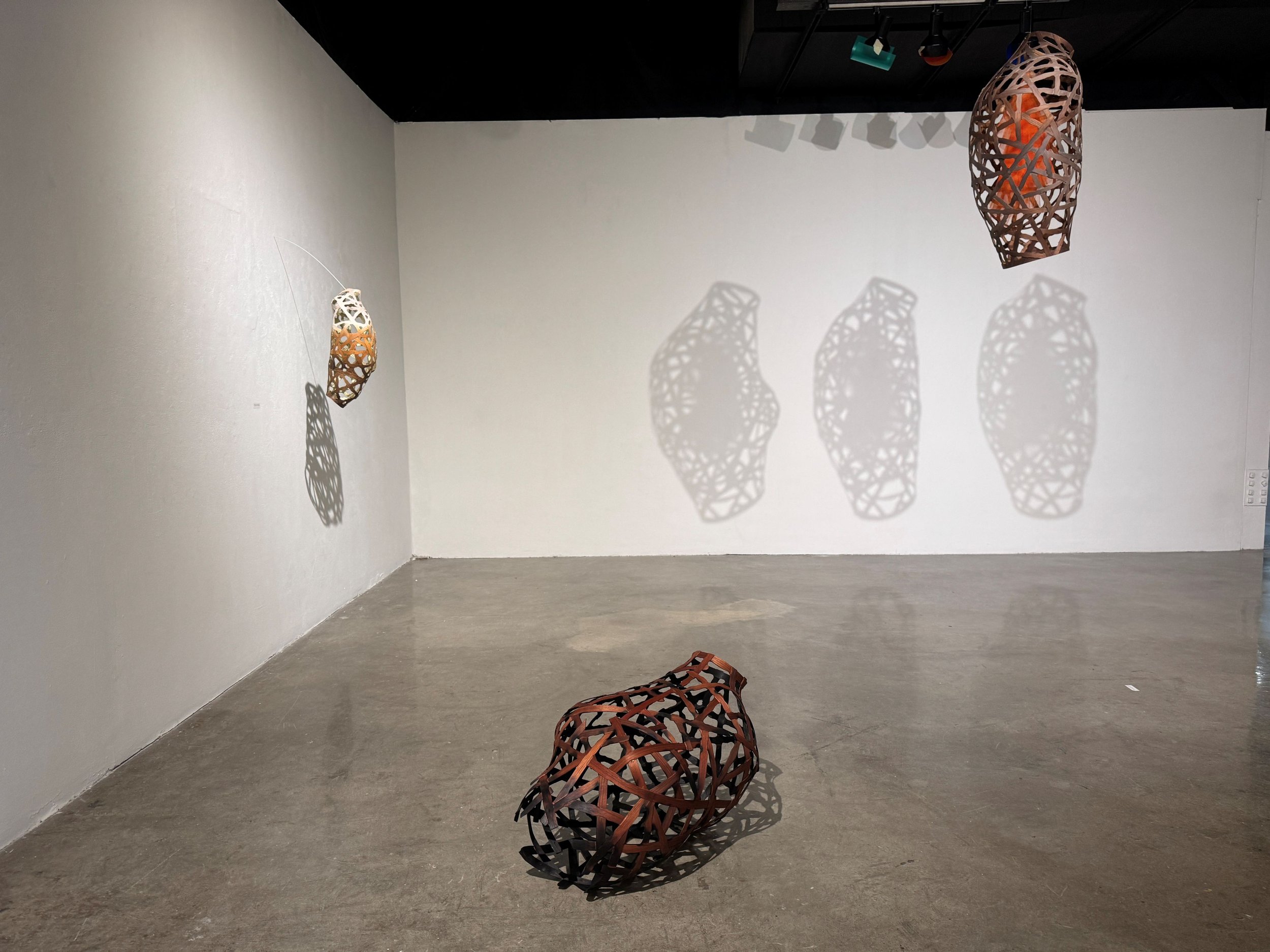 Installation of three wood veneer sculptures 2025