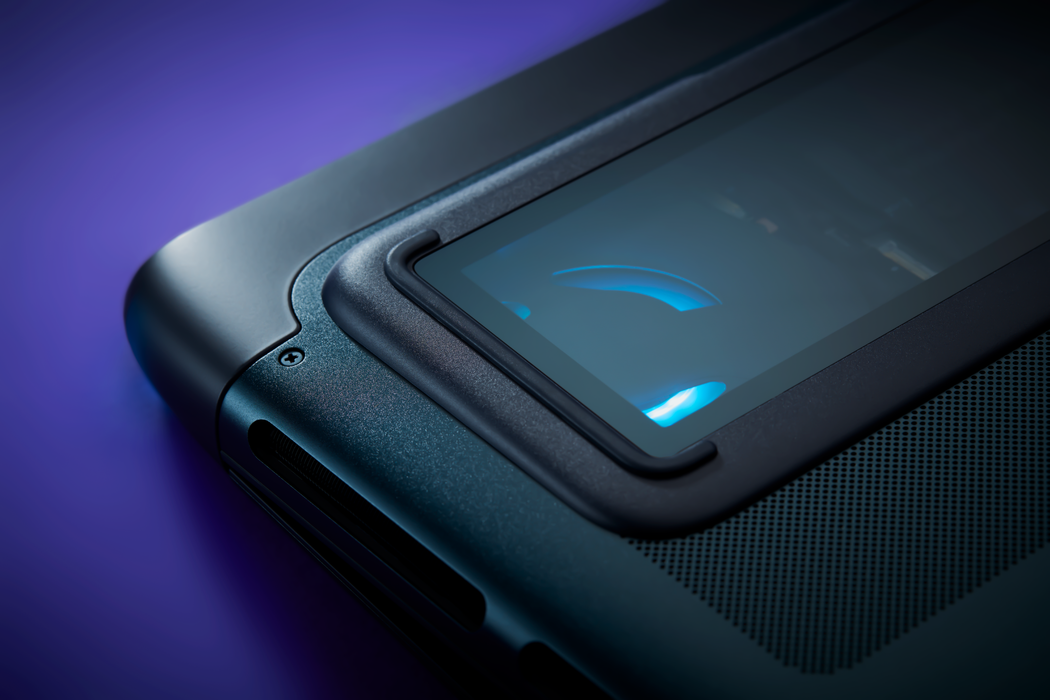 Close-up of a futuristic electronic device with a glass window showing blue lighting, set against a purple background.