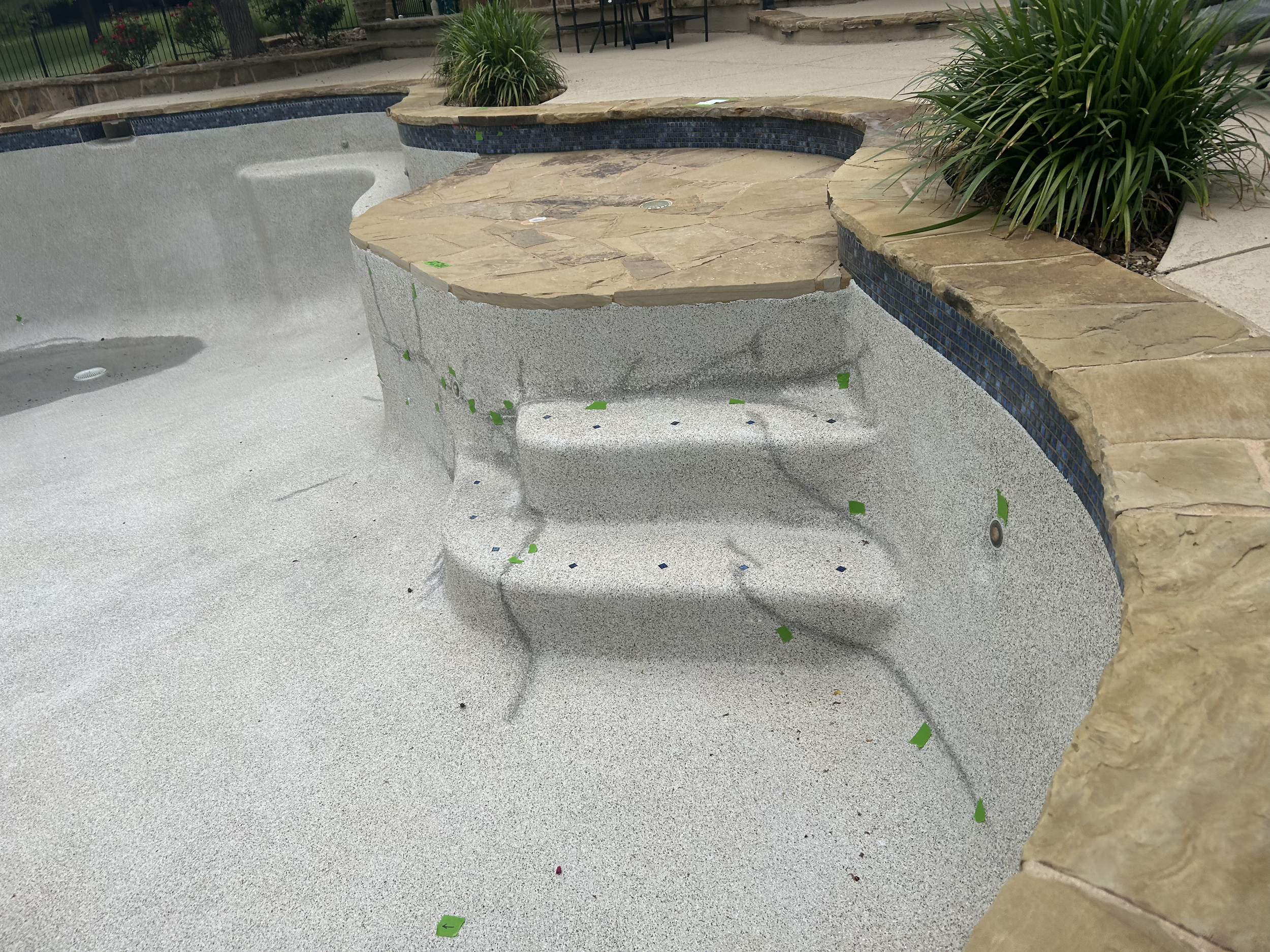 An image showing typical signs of ASR damage to a home pool