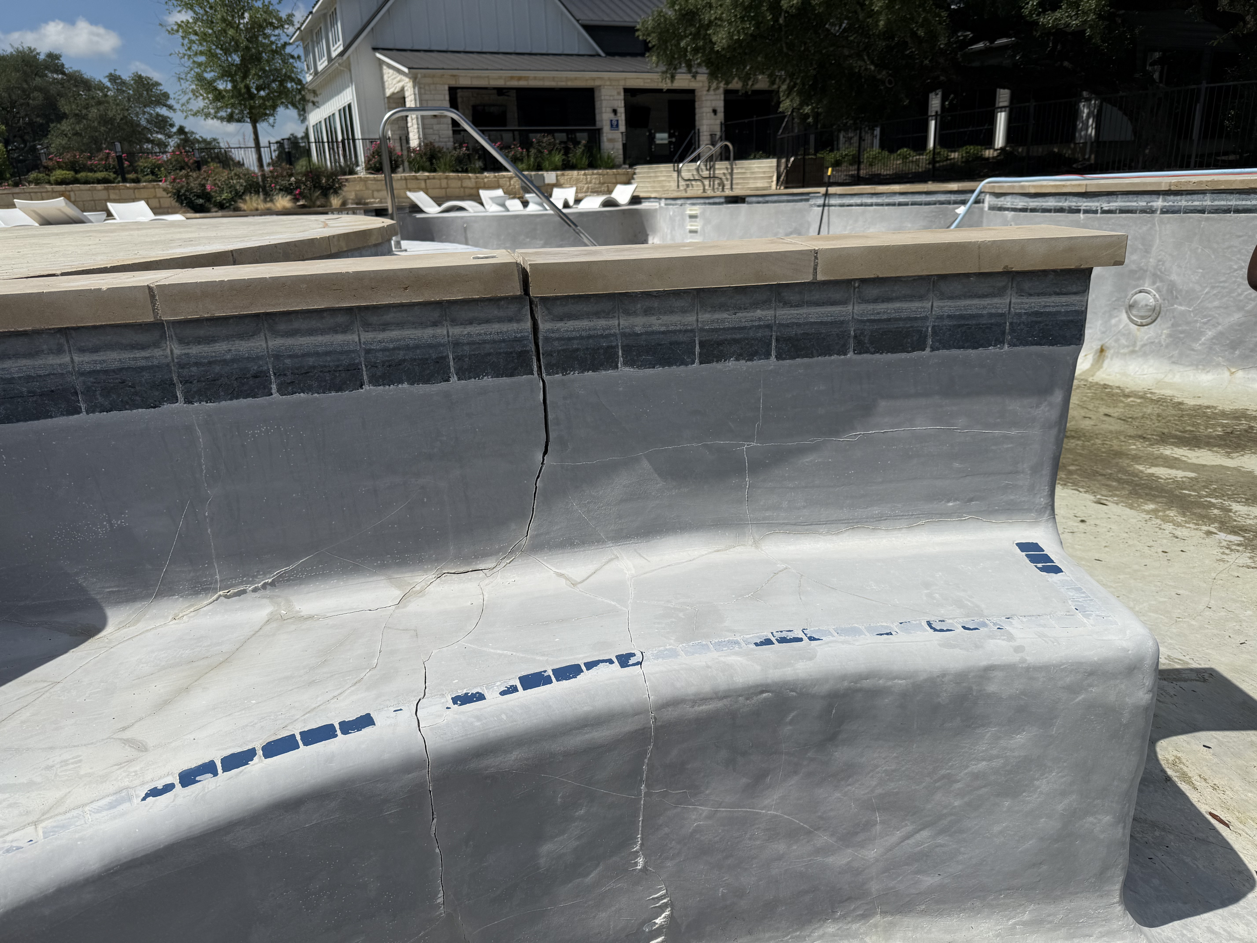 A shifting pool shell causes Strucutal damage due to improper orginal construction