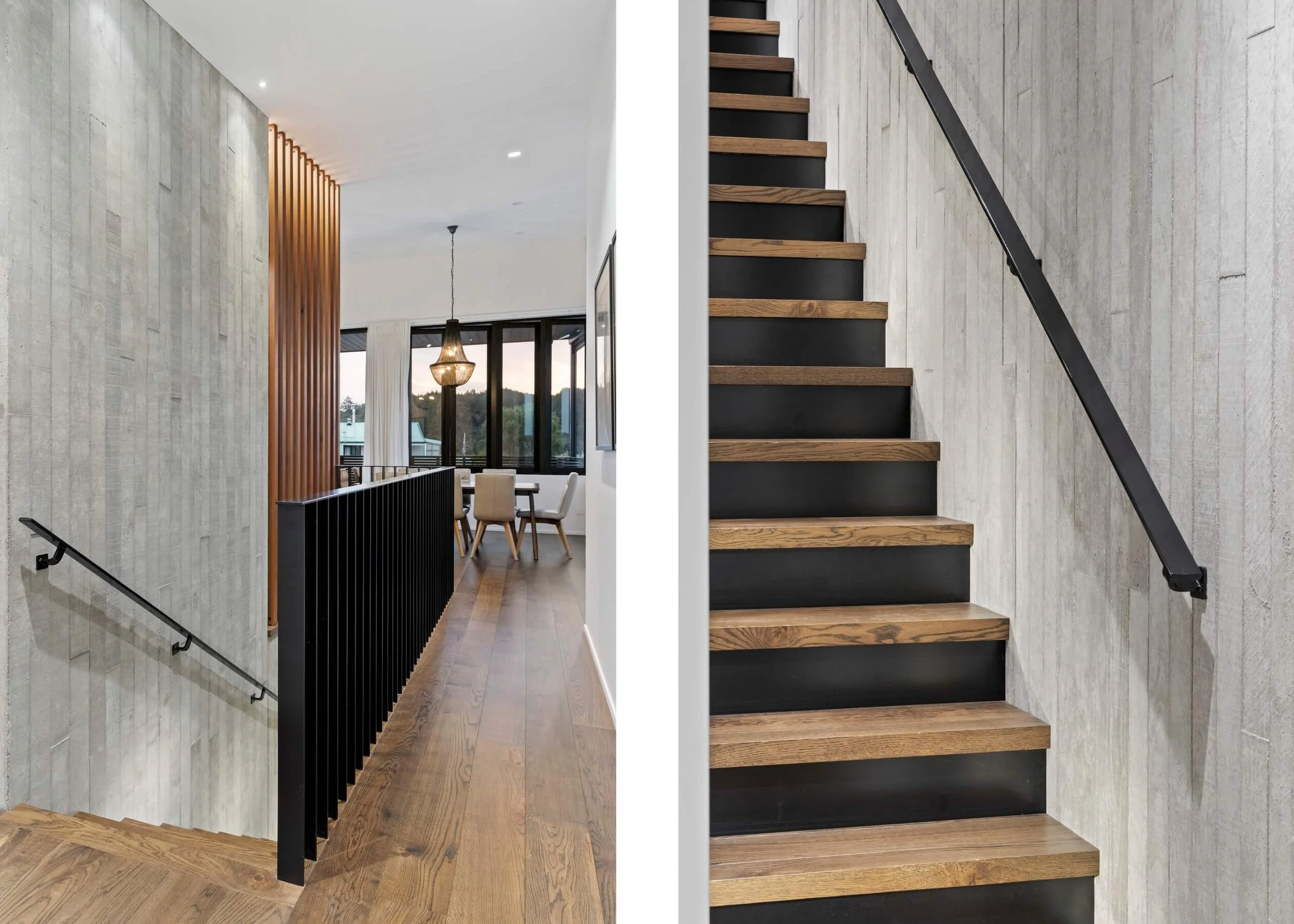 Interior view of a modern home with a staircase, a dining area with a hanging chandelier, large windows with curtains, and wood floors.