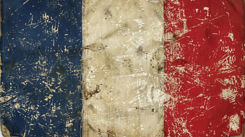 An old, worn French flag with vertical blue, white, and red stripes, showing scratches, tears, and faded colours.