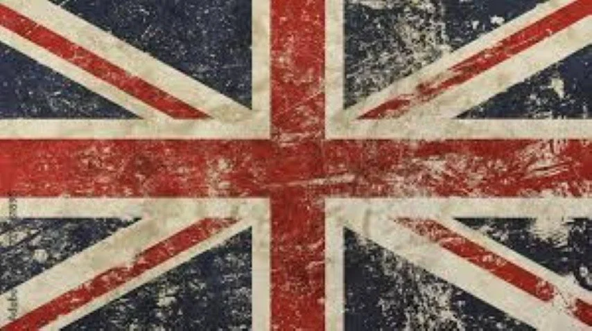 Vintage distressed British flag painted on surface.