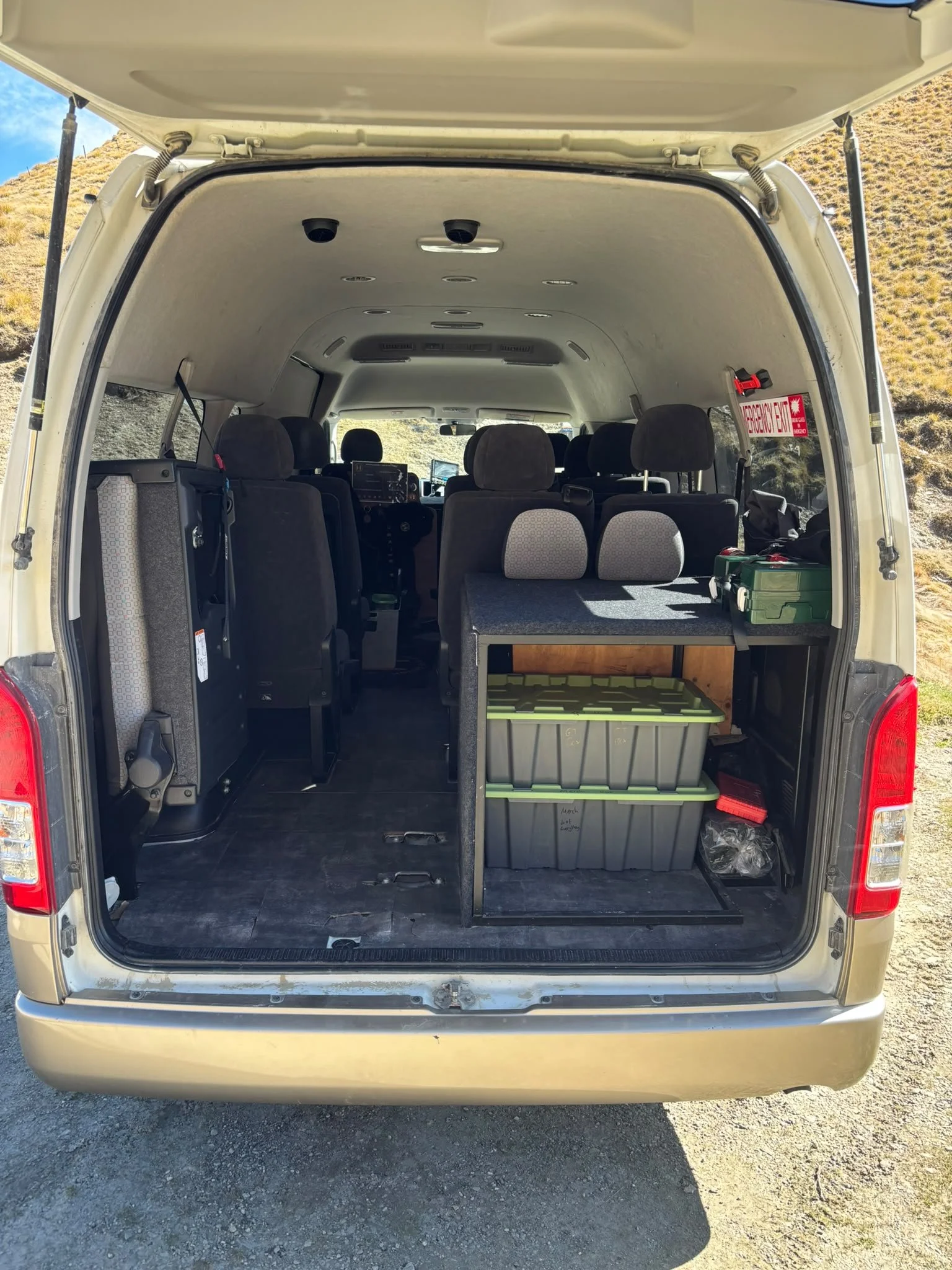 Back row folding seats up