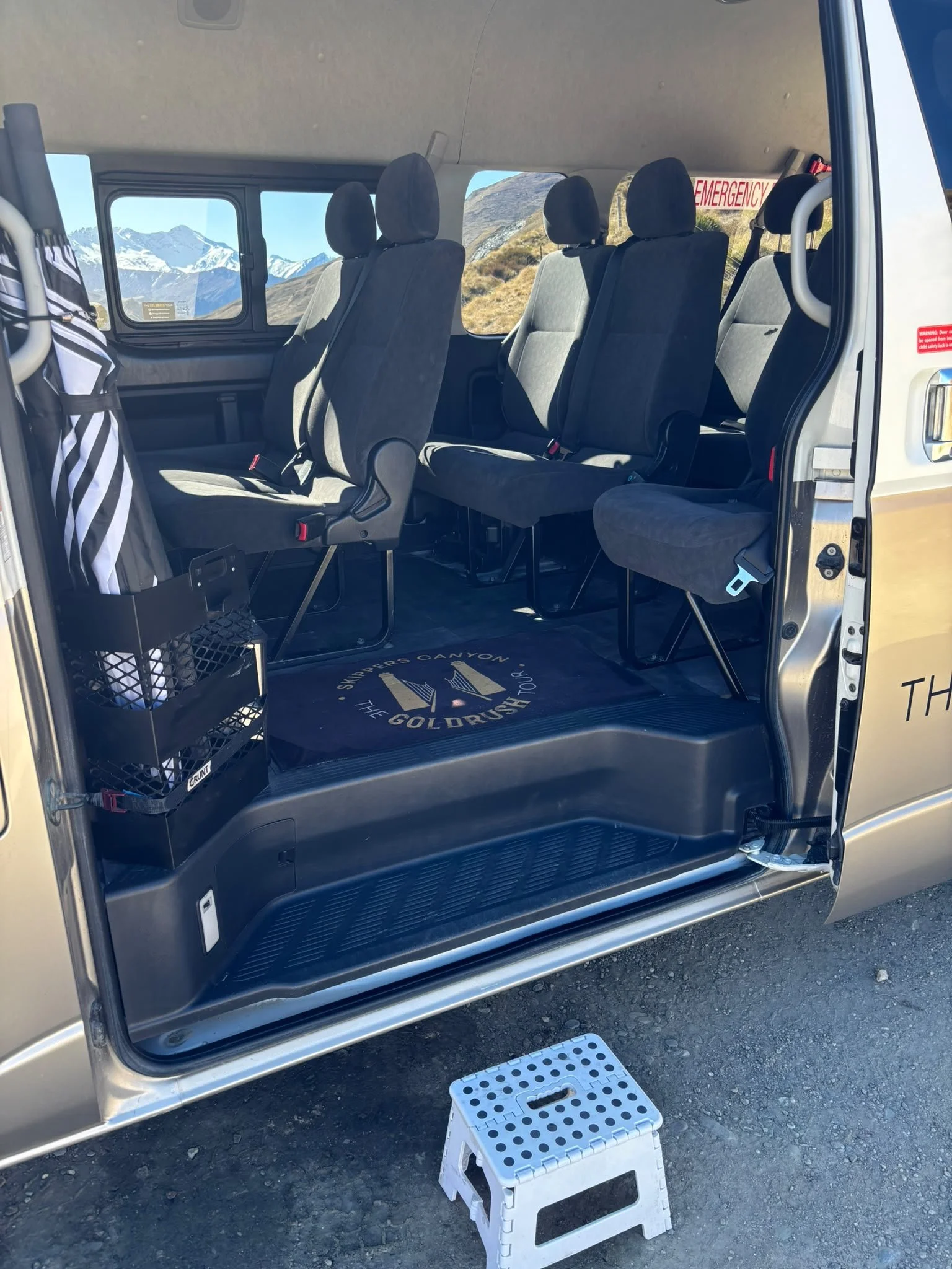 Side door entrance with folding step