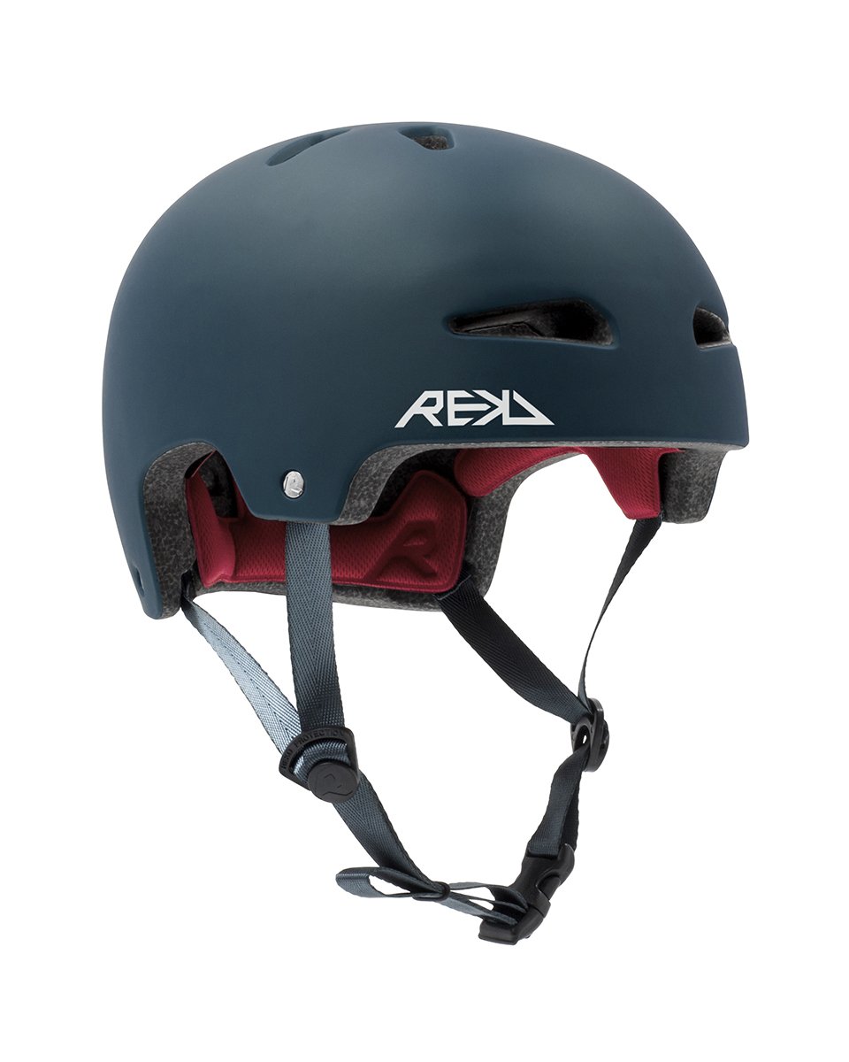 A dark blue, multi-vented safety helmet with adjustable black straps and pink padding inside, branded with the white text "REKD."