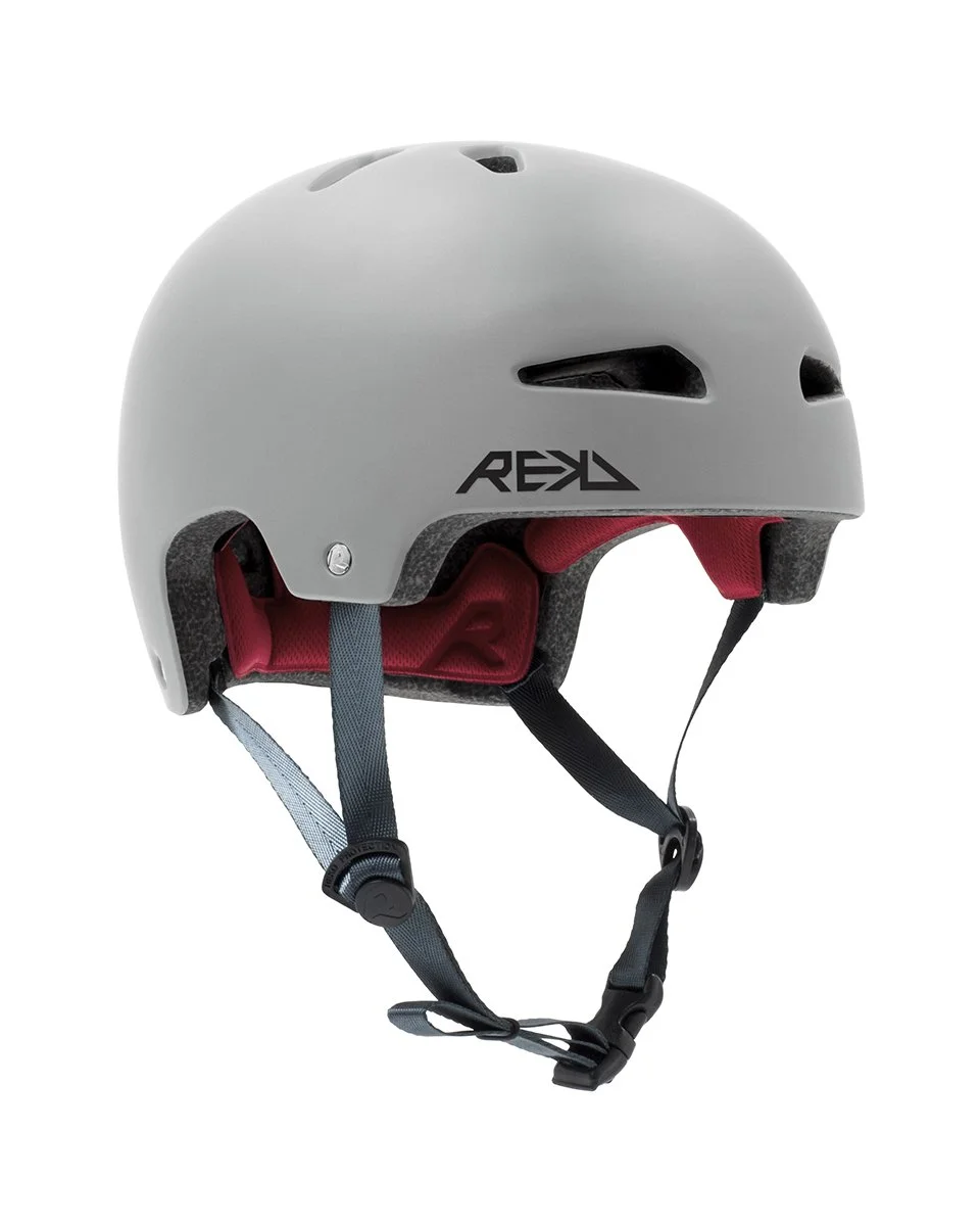 Gray safety helmet with black adjustable straps and red padding inside, branded 'REKD'.