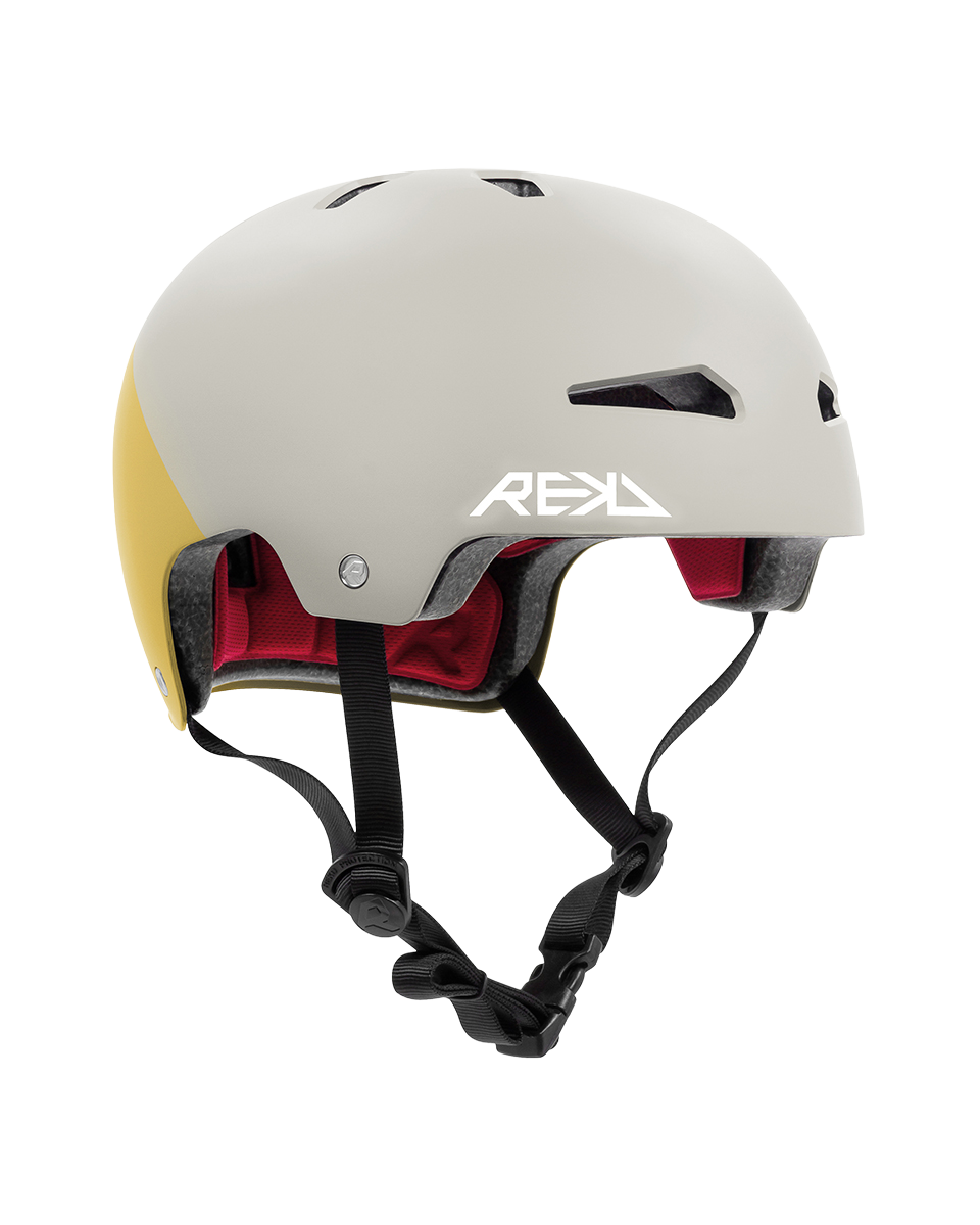 A white and yellow modern ski or snowboard helmet with black adjustable straps, ear protections with red padding, and ventilation openings. Elite 2.0.