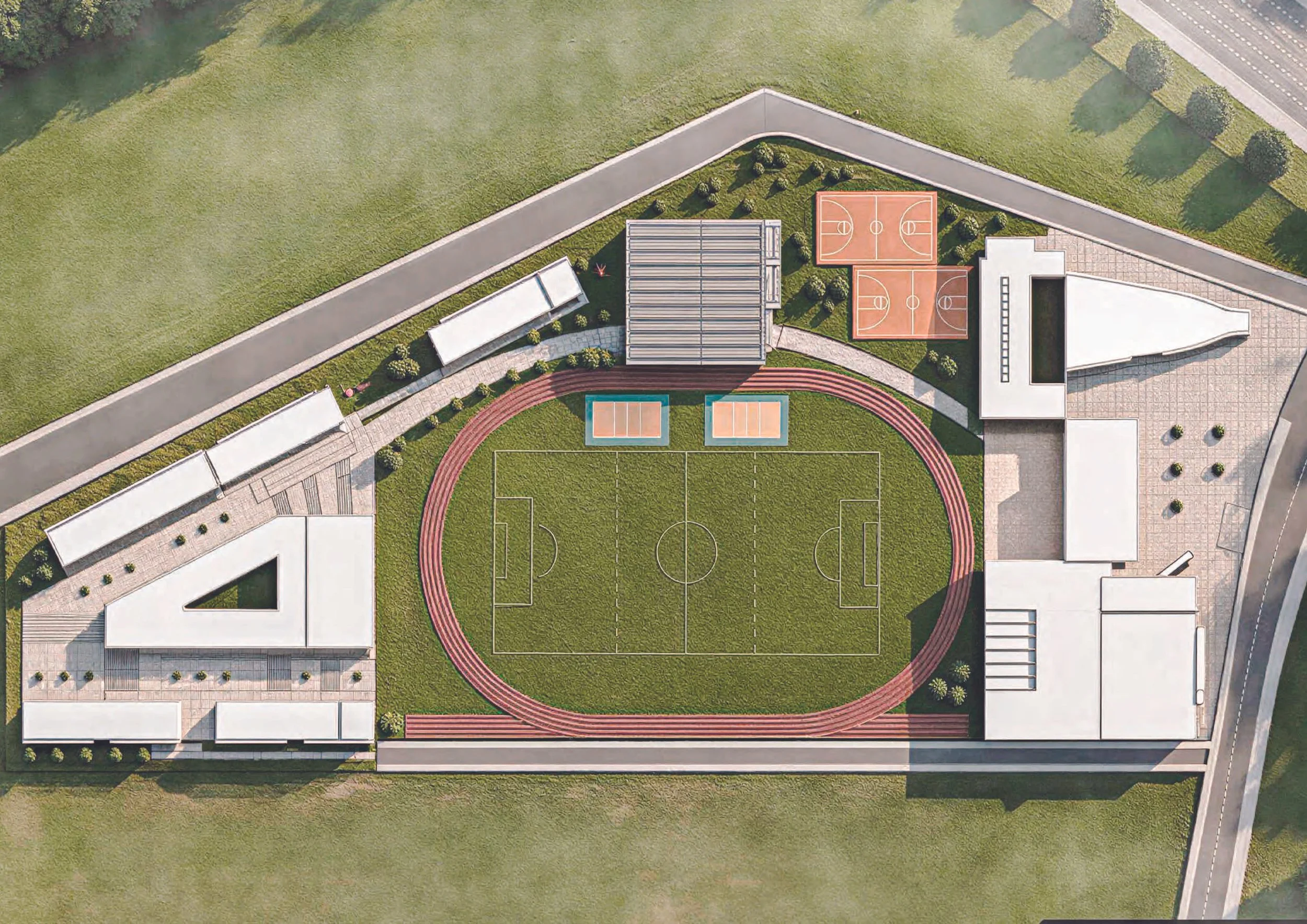 An aerial view of a sports complex with a rectangular soccer field, two tennis courts, a running track, and surrounding pathways and greenery.