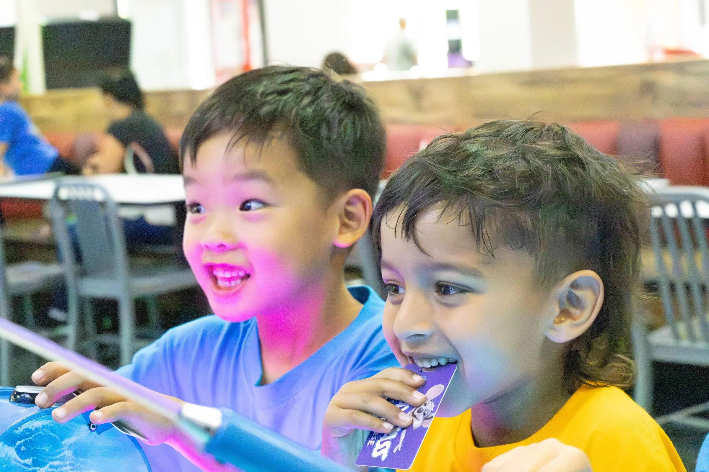 Two young campers laughing together