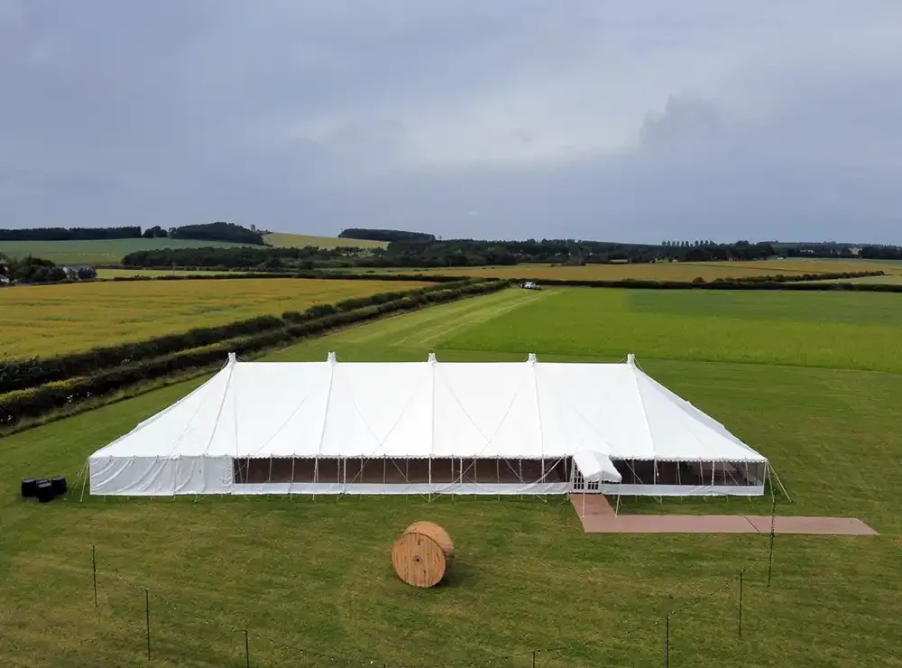 poled-outside-drone-wedding-farm-summer.webp