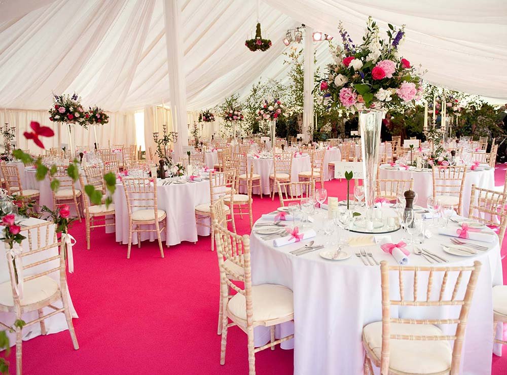 Best-Intent-Marquees-poled-marquee-pink-carpet-round-tables-wedding.jpg