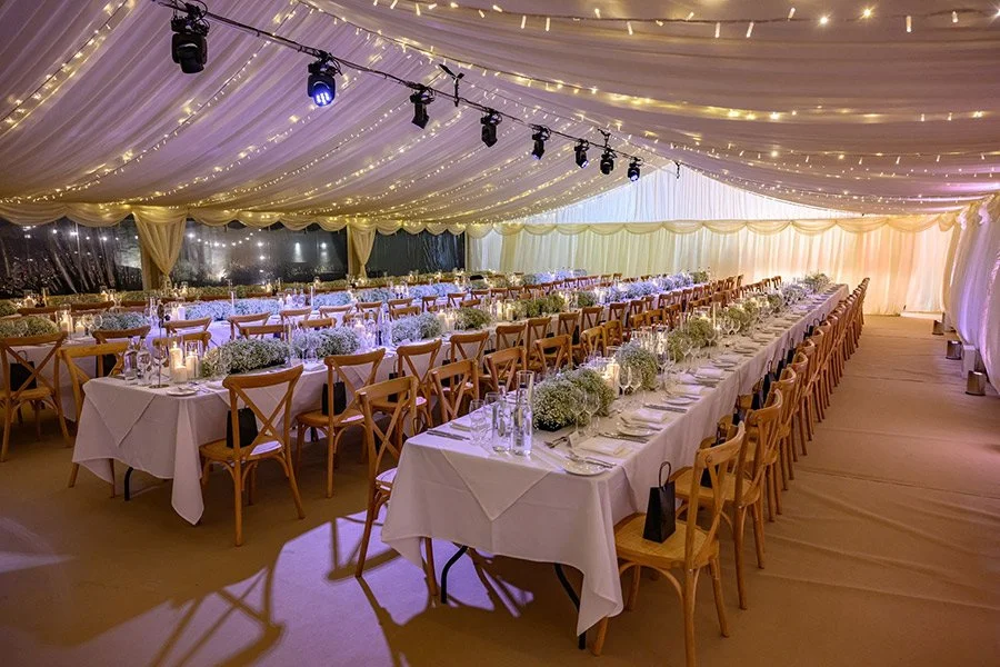 marquee-fairylights-Lyle-and-Scott-long-tables-1.jpg
