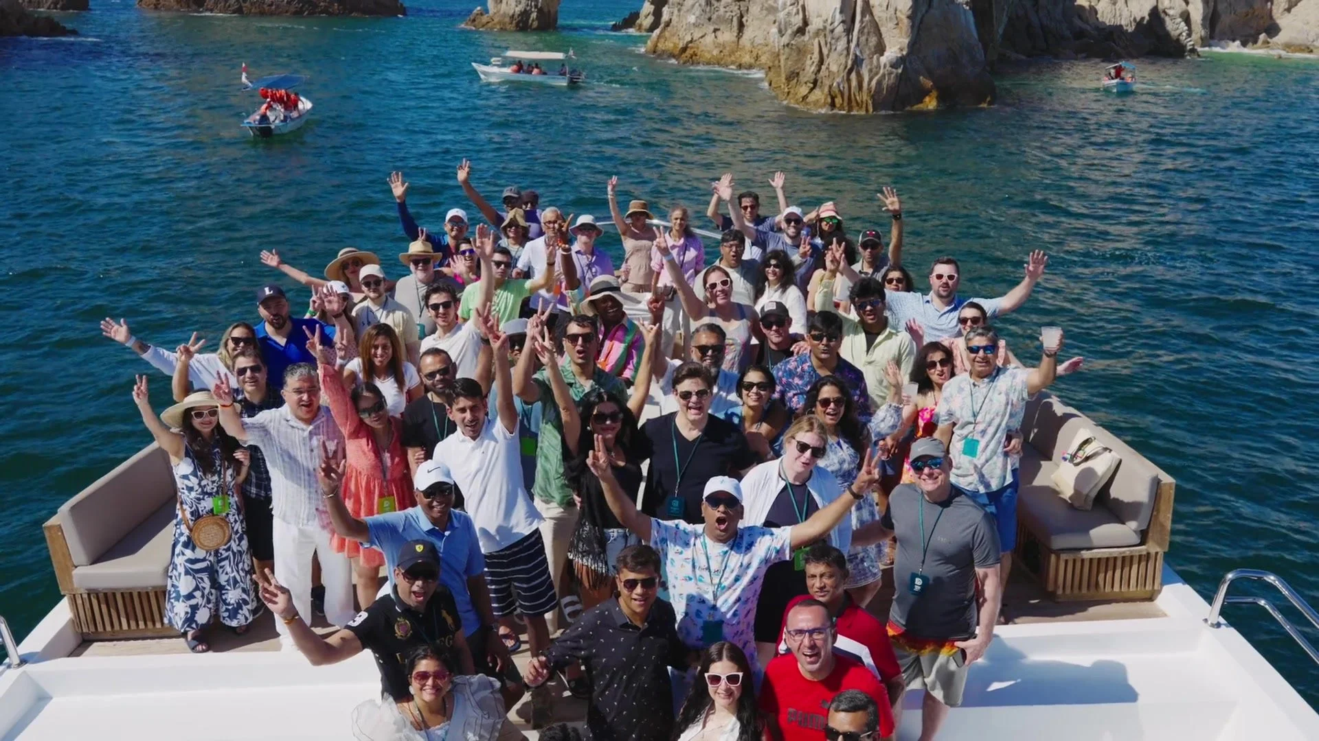 Capgemini attendees celebrating together on the water