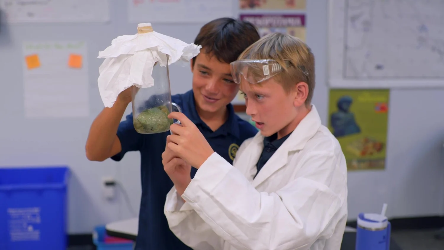 Students collaborate on a classroom science project at Charleston Collegiate.