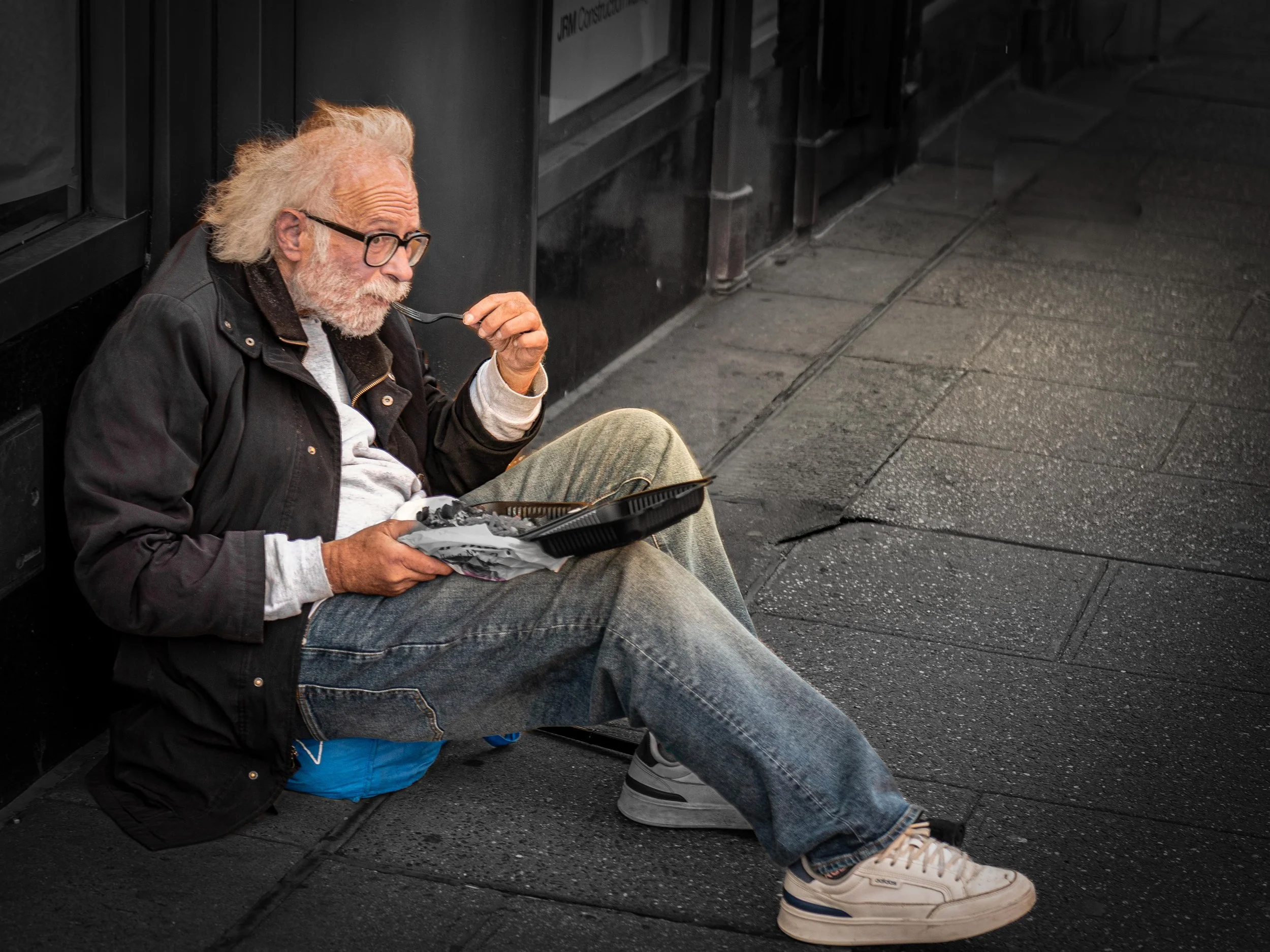 man eating lunch on the street.jpg