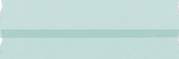 Close-up of a painted wooden surface in light turquoise color.