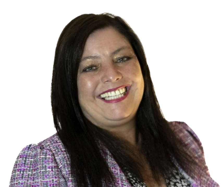 A woman with long dark hair, smiling, wearing a patterned blazer and lipstick.