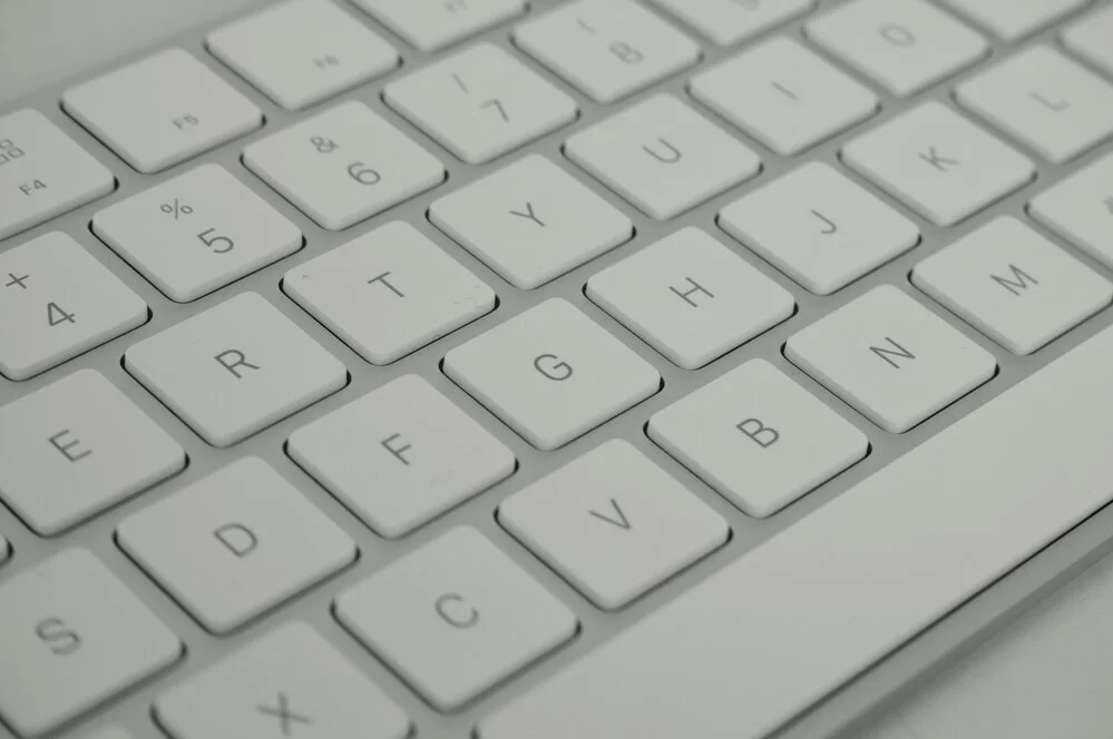 Up close photo of a white keyboard