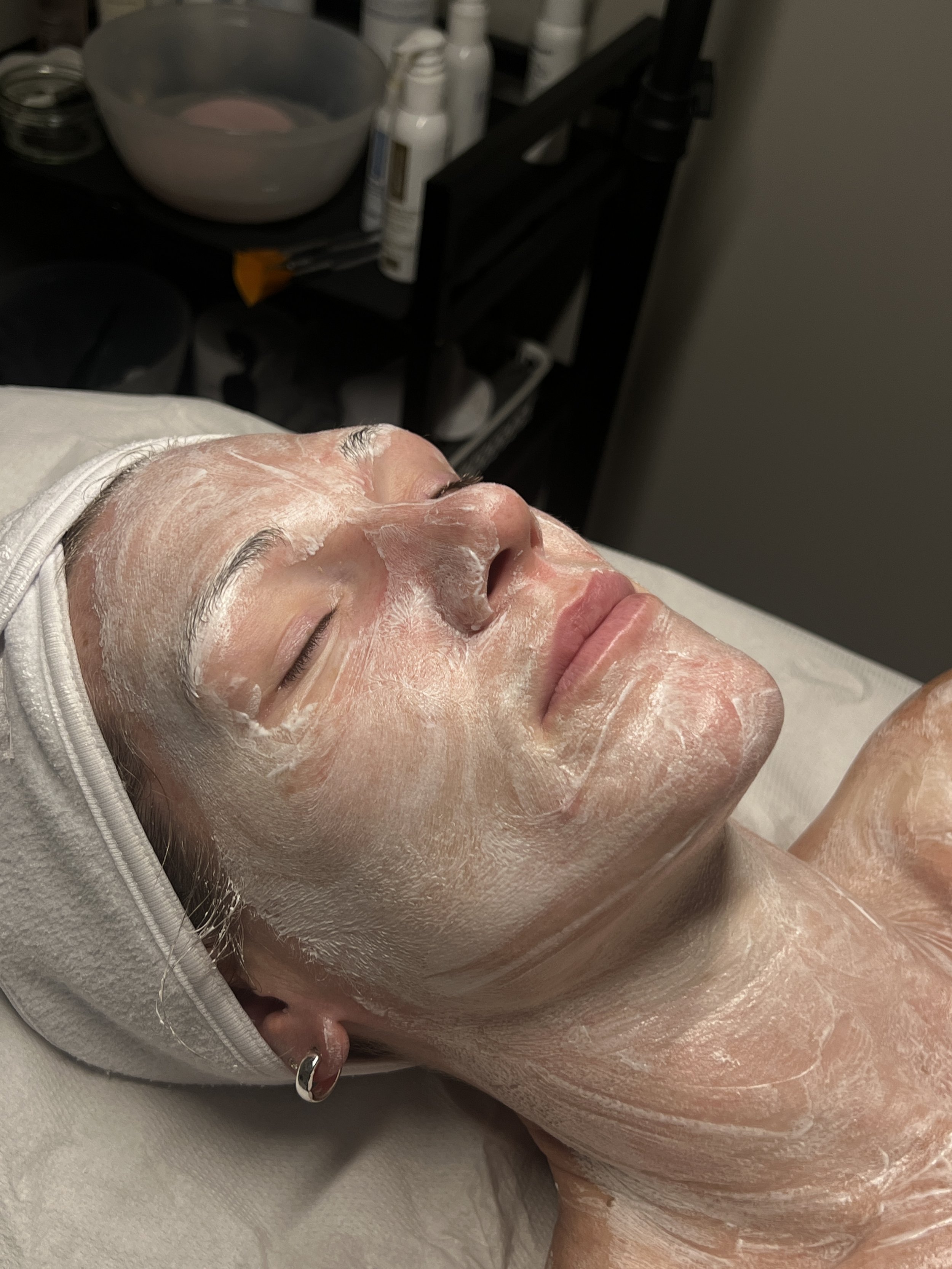 Client relaxing with a facial mask during a bespoke facial at Beau.t.