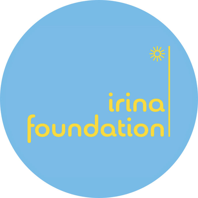 Logo of the Irina Foundation on a light blue circular background, with a small yellow sun and a vertical yellow line.