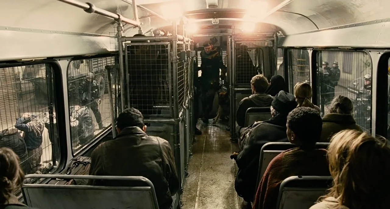 A guard and his dog enter the bus en route to Bexhill.