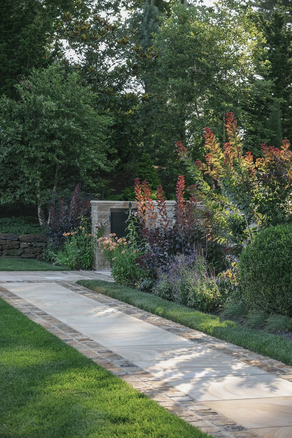Stone path through planting beside the lawn, Riverfront Estate, Navesink River