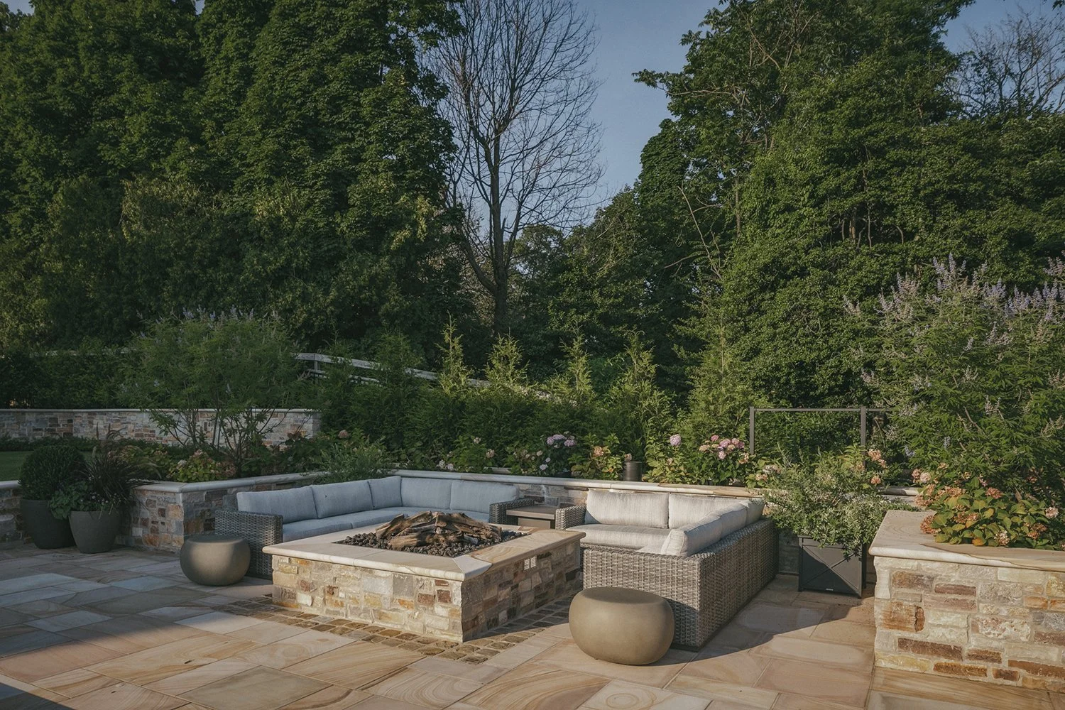Fire pit and built-in seating on the upper terrace, Riverfront Estate, Navesink River